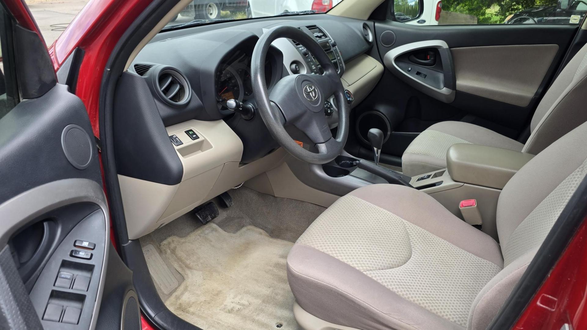 2007 Red /Tan Toyota RAV4 Base I4 4WD (JTMBD33V075) with an 2.4L L4 DOHC 16V engine, 4-Speed Automatic transmission, located at 450 N Russell, Missoula, MT, 59801, (406) 543-6600, 46.874496, -114.017433 - Reliable Toyota AWD. 2.4L I4 Engine. Automatic Transmission. Freezing Cold Air Conditioning. Cruise Control. Tilt Steering. AM FM CD Player. Power Windows and Locks. Has a Clean Title and Carfax. We Finance through local Credit Unions. We do NOT offer In House (Buy Here Pay Here) Financing. - Photo#11