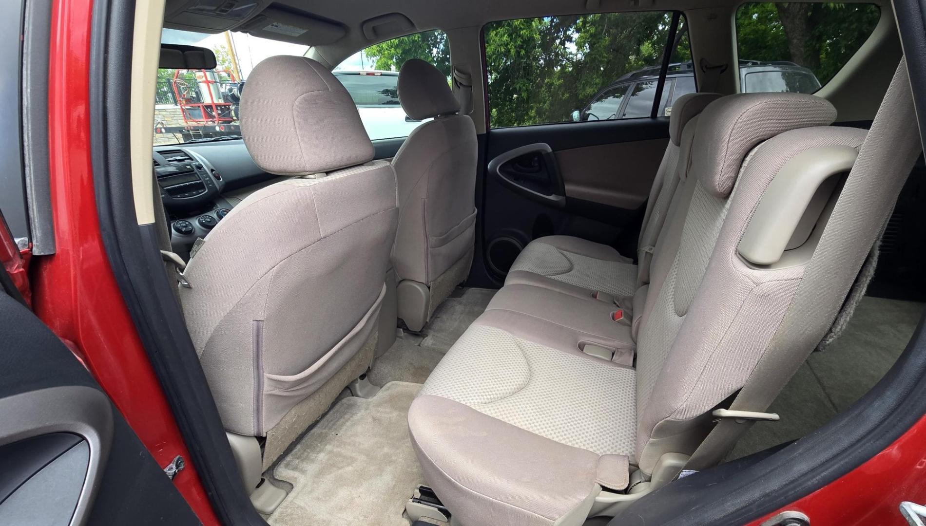 2007 Red /Tan Toyota RAV4 Base I4 4WD (JTMBD33V075) with an 2.4L L4 DOHC 16V engine, 4-Speed Automatic transmission, located at 450 N Russell, Missoula, MT, 59801, (406) 543-6600, 46.874496, -114.017433 - Reliable Toyota AWD. 2.4L I4 Engine. Automatic Transmission. Freezing Cold Air Conditioning. Cruise Control. Tilt Steering. AM FM CD Player. Power Windows and Locks. Has a Clean Title and Carfax. We Finance through local Credit Unions. We do NOT offer In House (Buy Here Pay Here) Financing. - Photo#12