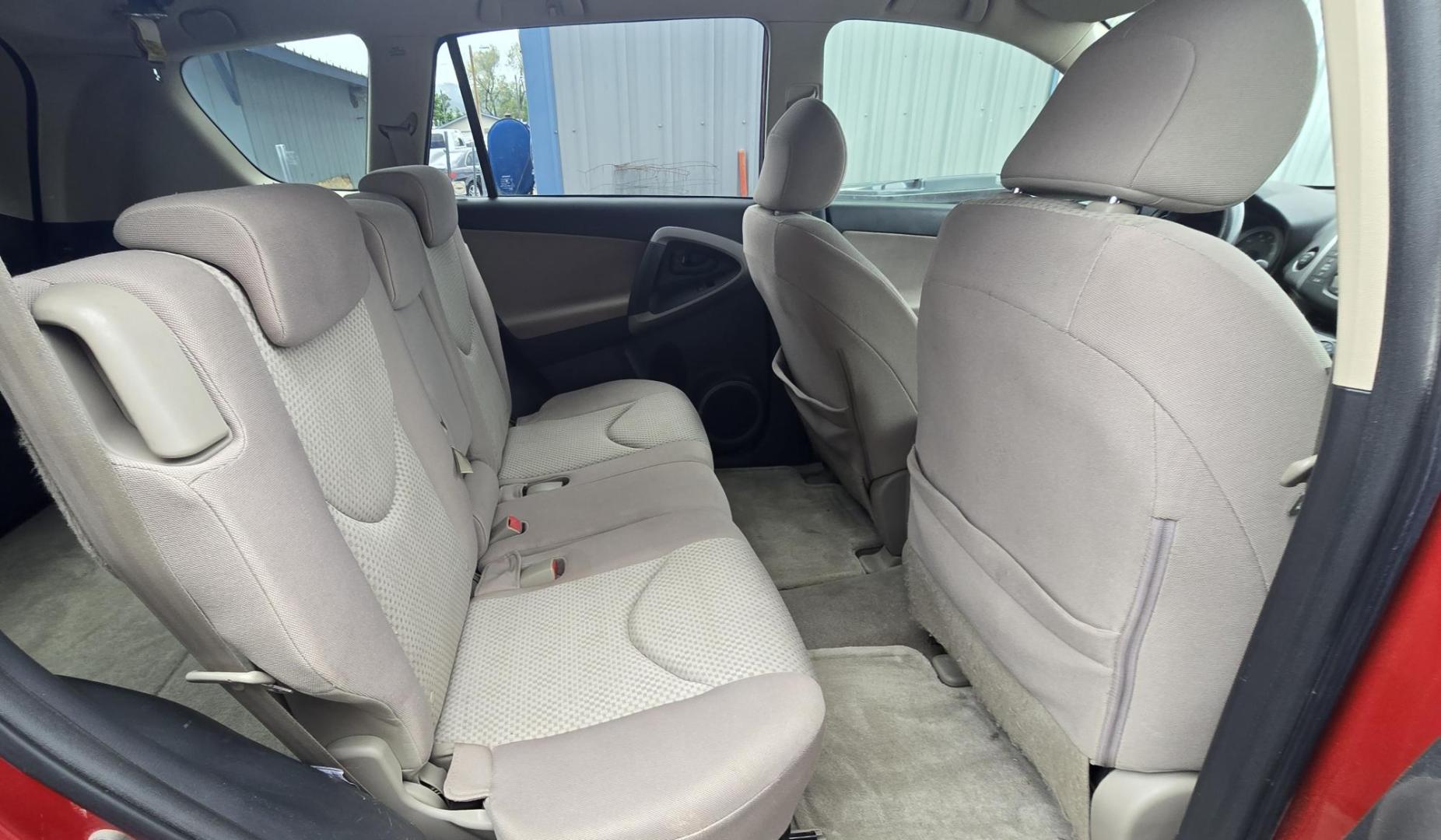 2007 Red /Tan Toyota RAV4 Base I4 4WD (JTMBD33V075) with an 2.4L L4 DOHC 16V engine, 4-Speed Automatic transmission, located at 450 N Russell, Missoula, MT, 59801, (406) 543-6600, 46.874496, -114.017433 - Reliable Toyota AWD. 2.4L I4 Engine. Automatic Transmission. Freezing Cold Air Conditioning. Cruise Control. Tilt Steering. AM FM CD Player. Power Windows and Locks. Has a Clean Title and Carfax. We Finance through local Credit Unions. We do NOT offer In House (Buy Here Pay Here) Financing. - Photo#14