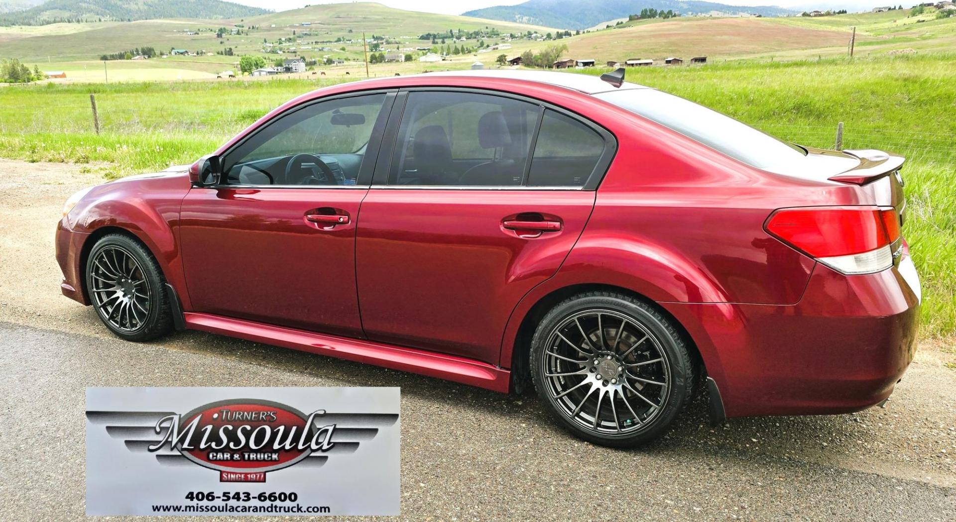 2011 Red /Black Subaru Legacy GT 2.5GT Limited (4S3BMFK6XB1) with an 2.5L H4 DOHC 16V TURBO engine, 6-Speed Manual transmission, located at 450 N Russell, Missoula, MT, 59801, (406) 543-6600, 46.874496, -114.017433 - Beautiful Metallic Red Subaru AWD. Zippy 2.5L Turbo Engine. 6 Speed Manual Transmission. New Performance Clutch. Black Leather Interior. Heated Front Seats. Air. Cruise. Tilt. AM CD CD Changer. Bluetooth Phone Connection. Power Windows and Locks. Power Sunroof. New Timing Belt and Transmission at 73 - Photo#4
