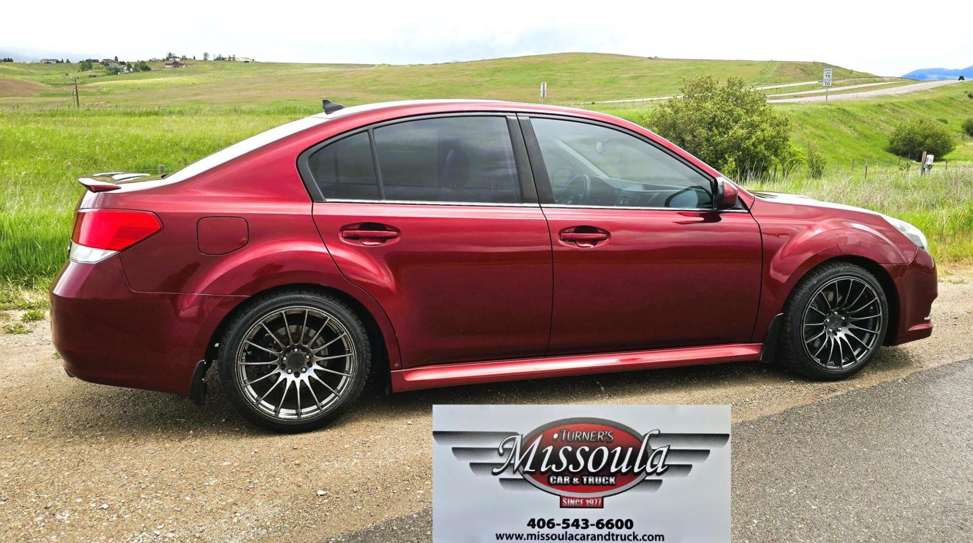 2011 Red /Black Subaru Legacy GT 2.5GT Limited (4S3BMFK6XB1) with an 2.5L H4 DOHC 16V TURBO engine, 6-Speed Manual transmission, located at 450 N Russell, Missoula, MT, 59801, (406) 543-6600, 46.874496, -114.017433 - Beautiful Metallic Red Subaru AWD. Zippy 2.5L Turbo Engine. 6 Speed Manual Transmission. New Performance Clutch. Black Leather Interior. Heated Front Seats. Air. Cruise. Tilt. AM CD CD Changer. Bluetooth Phone Connection. Power Windows and Locks. Power Sunroof. New Timing Belt and Transmission at 73 - Photo#3