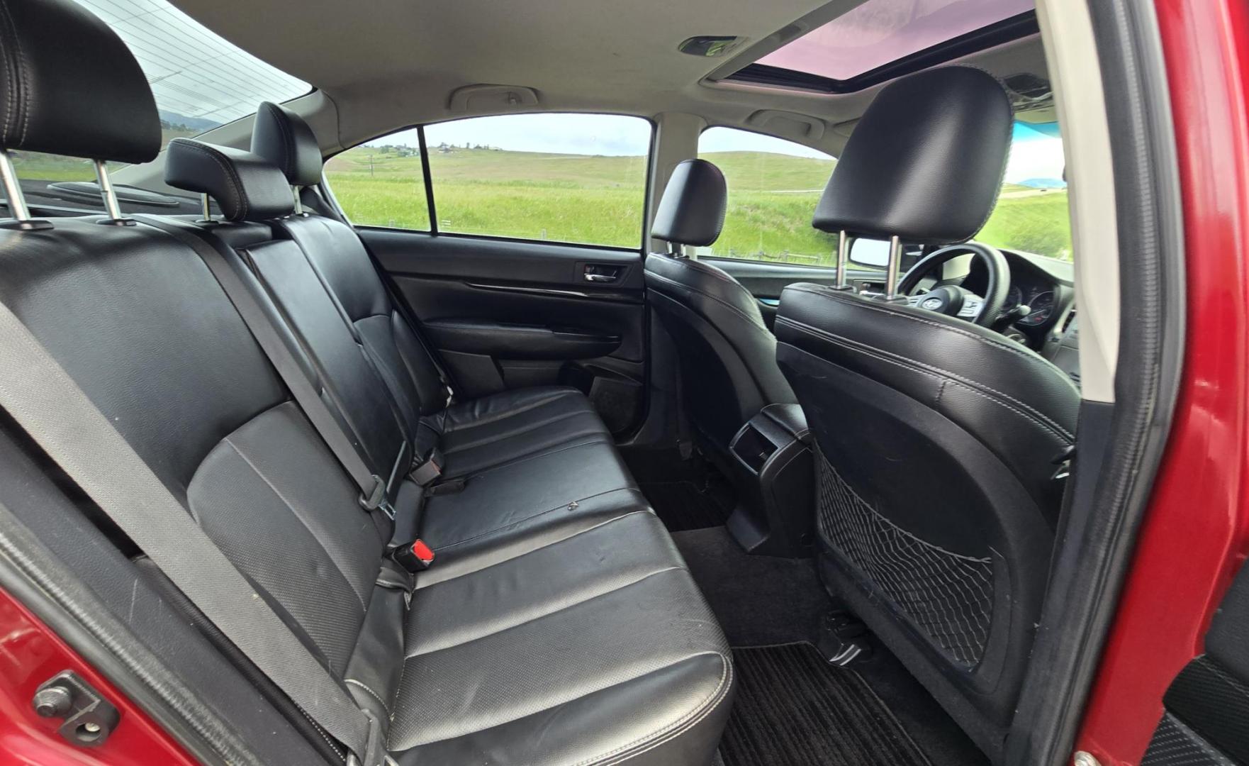 2011 Red /Black Subaru Legacy GT 2.5GT Limited (4S3BMFK6XB1) with an 2.5L H4 DOHC 16V TURBO engine, 6-Speed Manual transmission, located at 450 N Russell, Missoula, MT, 59801, (406) 543-6600, 46.874496, -114.017433 - Beautiful Metallic Red Subaru AWD. Zippy 2.5L Turbo Engine. 6 Speed Manual Transmission. New Performance Clutch. Black Leather Interior. Heated Front Seats. Air. Cruise. Tilt. AM CD CD Changer. Bluetooth Phone Connection. Power Windows and Locks. Power Sunroof. New Timing Belt and Transmission at 73 - Photo#11