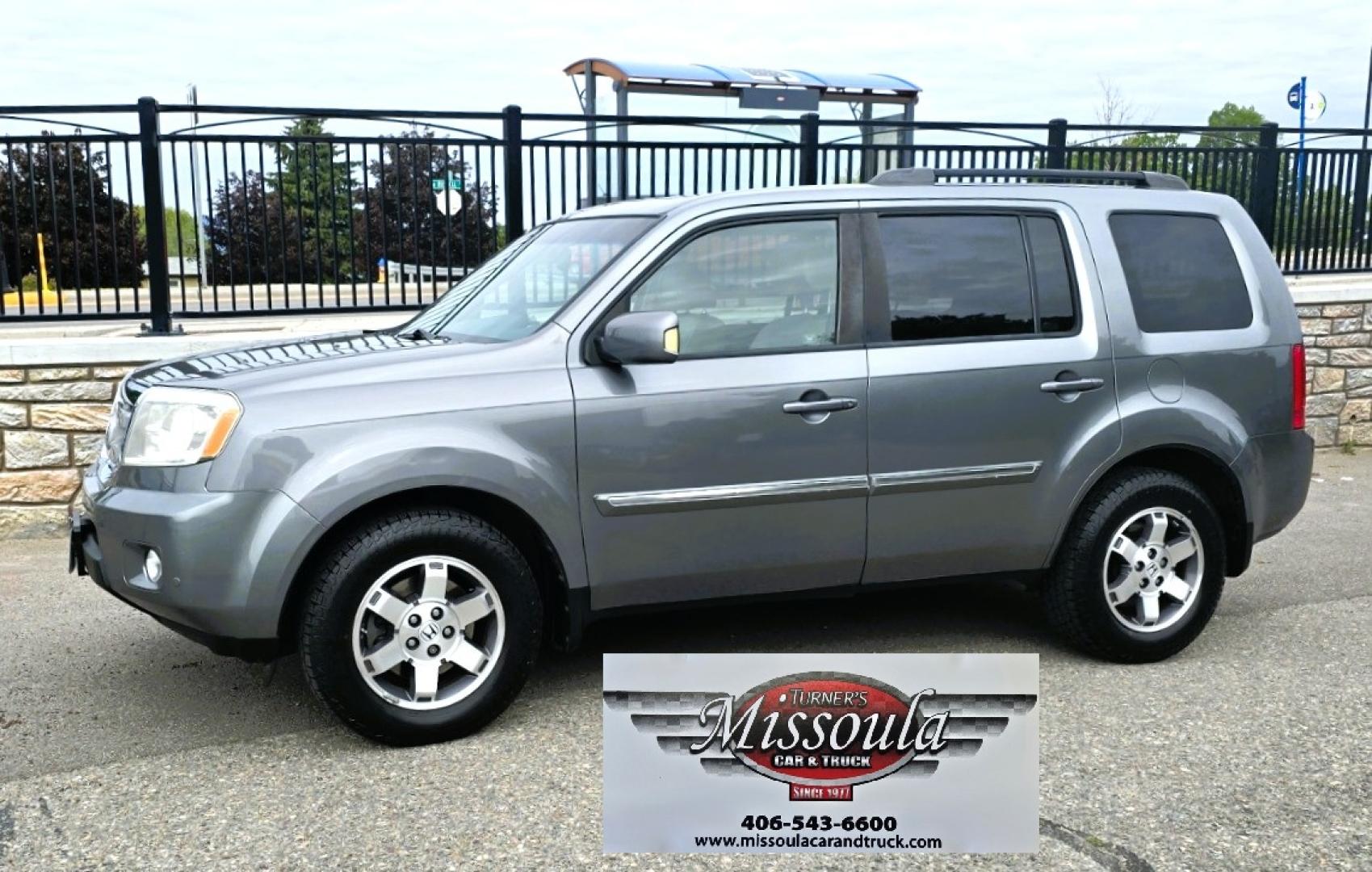 2009 Grey /Black Honda Pilot Touring 4WD (5FNYF48819B) with an 3.5L V6 SOHC 24V engine, 5-Speed Automatic transmission, located at 450 N Russell, Missoula, MT, 59801, (406) 543-6600, 46.874496, -114.017433 - 2 Owner Honda AWD SUV. 3.5L V6 Engine. Automatic Transmission. 3rd Row Seating. Heated Power Front Seats. Power Sunroof. AM FM CD Player. Air. Cruise. Tilt. Bluetooth Phone Connection. Power Liftgate. New Tires. Catalytic converter replaced 30K miles ago. We Finance through local Credit Unions. - Photo#1