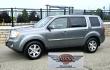 2009 Grey /Black Honda Pilot Touring 4WD (5FNYF48819B) with an 3.5L V6 SOHC 24V engine, 5-Speed Automatic transmission, located at 450 N Russell, Missoula, MT, 59801, (406) 543-6600, 46.874496, -114.017433 - 2 Owner Honda AWD SUV. 3.5L V6 Engine. Automatic Transmission. 3rd Row Seating. Heated Power Front Seats. Power Sunroof. AM FM CD Player. Air. Cruise. Tilt. Bluetooth Phone Connection. Power Liftgate. New Tires. Catalytic converter replaced 30K miles ago. We Finance through local Credit Unions. - Photo#1