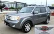 2009 Grey /Black Honda Pilot Touring 4WD (5FNYF48819B) with an 3.5L V6 SOHC 24V engine, 5-Speed Automatic transmission, located at 450 N Russell, Missoula, MT, 59801, (406) 543-6600, 46.874496, -114.017433 - 2 Owner Honda AWD SUV. 3.5L V6 Engine. Automatic Transmission. 3rd Row Seating. Heated Power Front Seats. Power Sunroof. AM FM CD Player. Air. Cruise. Tilt. Bluetooth Phone Connection. Power Liftgate. New Tires. Catalytic converter replaced 30K miles ago. We Finance through local Credit Unions. - Photo#2