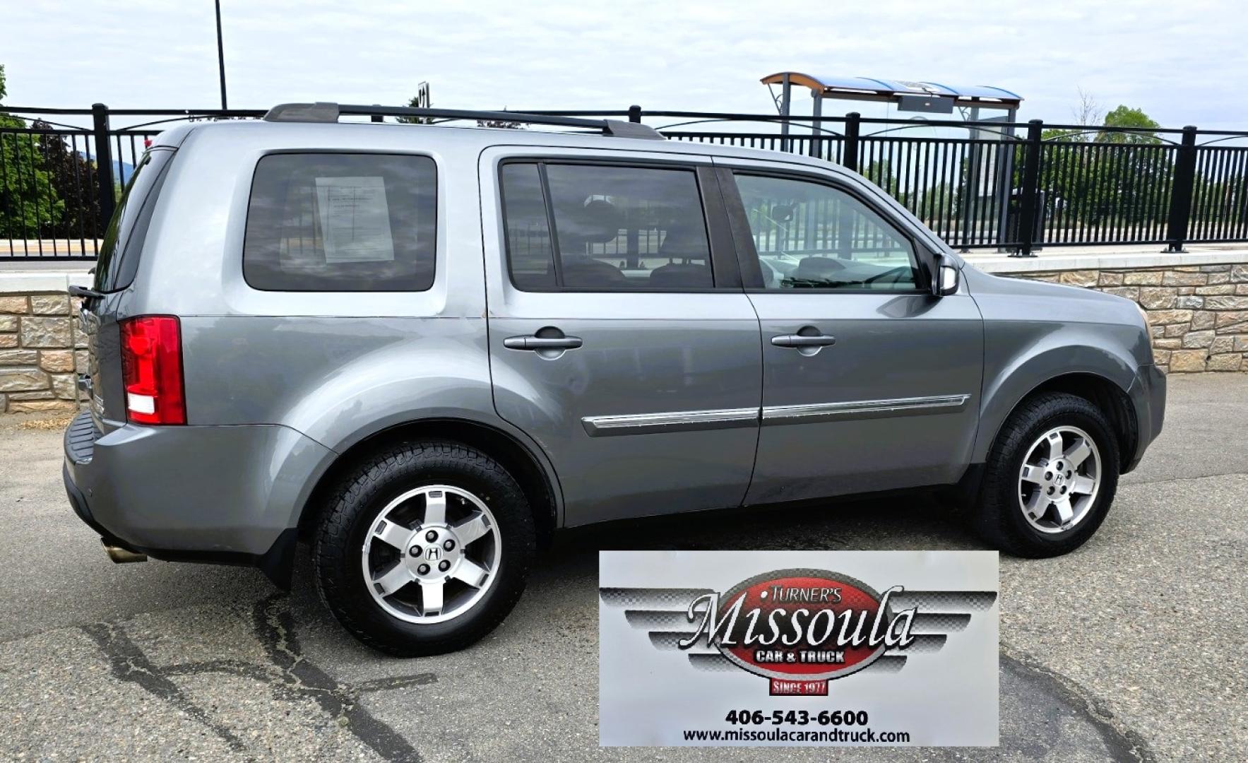 2009 Grey /Black Honda Pilot Touring 4WD (5FNYF48819B) with an 3.5L V6 SOHC 24V engine, 5-Speed Automatic transmission, located at 450 N Russell, Missoula, MT, 59801, (406) 543-6600, 46.874496, -114.017433 - 2 Owner Honda AWD SUV. 3.5L V6 Engine. Automatic Transmission. 3rd Row Seating. Heated Power Front Seats. Power Sunroof. AM FM CD Player. Air. Cruise. Tilt. Bluetooth Phone Connection. Power Liftgate. New Tires. Catalytic converter replaced 30K miles ago. We Finance through local Credit Unions. - Photo#6
