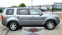 2009 Grey /Black Honda Pilot Touring 4WD (5FNYF48819B) with an 3.5L V6 SOHC 24V engine, 5-Speed Automatic transmission, located at 450 N Russell, Missoula, MT, 59801, (406) 543-6600, 46.874496, -114.017433 - 2 Owner Honda AWD SUV. 3.5L V6 Engine. Automatic Transmission. 3rd Row Seating. Heated Power Front Seats. Power Sunroof. AM FM CD Player. Air. Cruise. Tilt. Bluetooth Phone Connection. Power Liftgate. New Tires. Catalytic converter replaced 30K miles ago. We Finance through local Credit Unions. - Photo#7