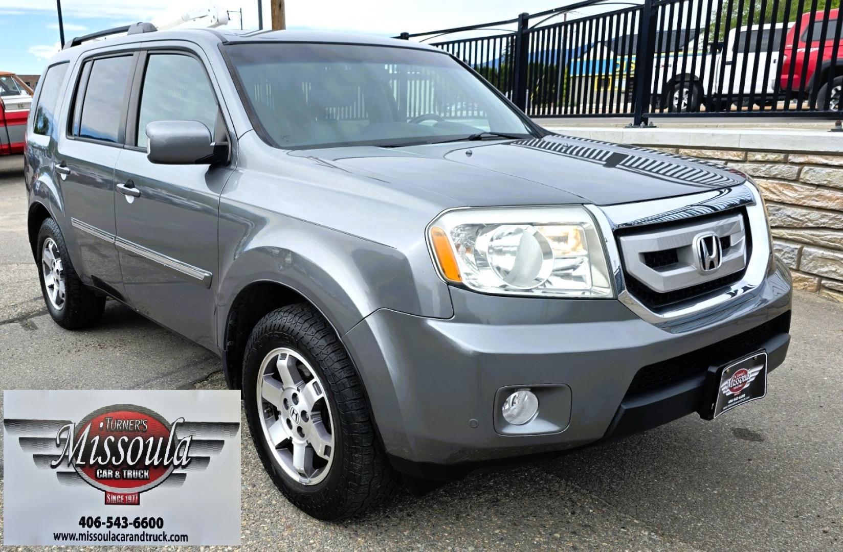 2009 Grey /Black Honda Pilot Touring 4WD (5FNYF48819B) with an 3.5L V6 SOHC 24V engine, 5-Speed Automatic transmission, located at 450 N Russell, Missoula, MT, 59801, (406) 543-6600, 46.874496, -114.017433 - 2 Owner Honda AWD SUV. 3.5L V6 Engine. Automatic Transmission. 3rd Row Seating. Heated Power Front Seats. Power Sunroof. AM FM CD Player. Air. Cruise. Tilt. Bluetooth Phone Connection. Power Liftgate. New Tires. Catalytic converter replaced 30K miles ago. We Finance through local Credit Unions. - Photo#8