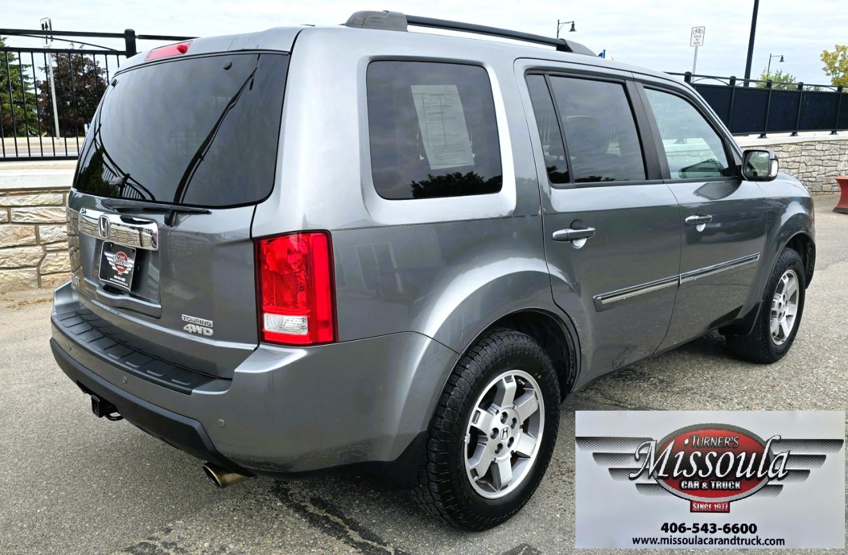 2009 Grey /Black Honda Pilot Touring 4WD (5FNYF48819B) with an 3.5L V6 SOHC 24V engine, 5-Speed Automatic transmission, located at 450 N Russell, Missoula, MT, 59801, (406) 543-6600, 46.874496, -114.017433 - 2 Owner Honda AWD SUV. 3.5L V6 Engine. Automatic Transmission. 3rd Row Seating. Heated Power Front Seats. Power Sunroof. AM FM CD Player. Air. Cruise. Tilt. Bluetooth Phone Connection. Power Liftgate. New Tires. Catalytic converter replaced 30K miles ago. We Finance through local Credit Unions. - Photo#9