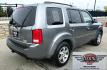 2009 Grey /Black Honda Pilot Touring 4WD (5FNYF48819B) with an 3.5L V6 SOHC 24V engine, 5-Speed Automatic transmission, located at 450 N Russell, Missoula, MT, 59801, (406) 543-6600, 46.874496, -114.017433 - 2 Owner Honda AWD SUV. 3.5L V6 Engine. Automatic Transmission. 3rd Row Seating. Heated Power Front Seats. Power Sunroof. AM FM CD Player. Air. Cruise. Tilt. Bluetooth Phone Connection. Power Liftgate. New Tires. Catalytic converter replaced 30K miles ago. We Finance through local Credit Unions. - Photo#9