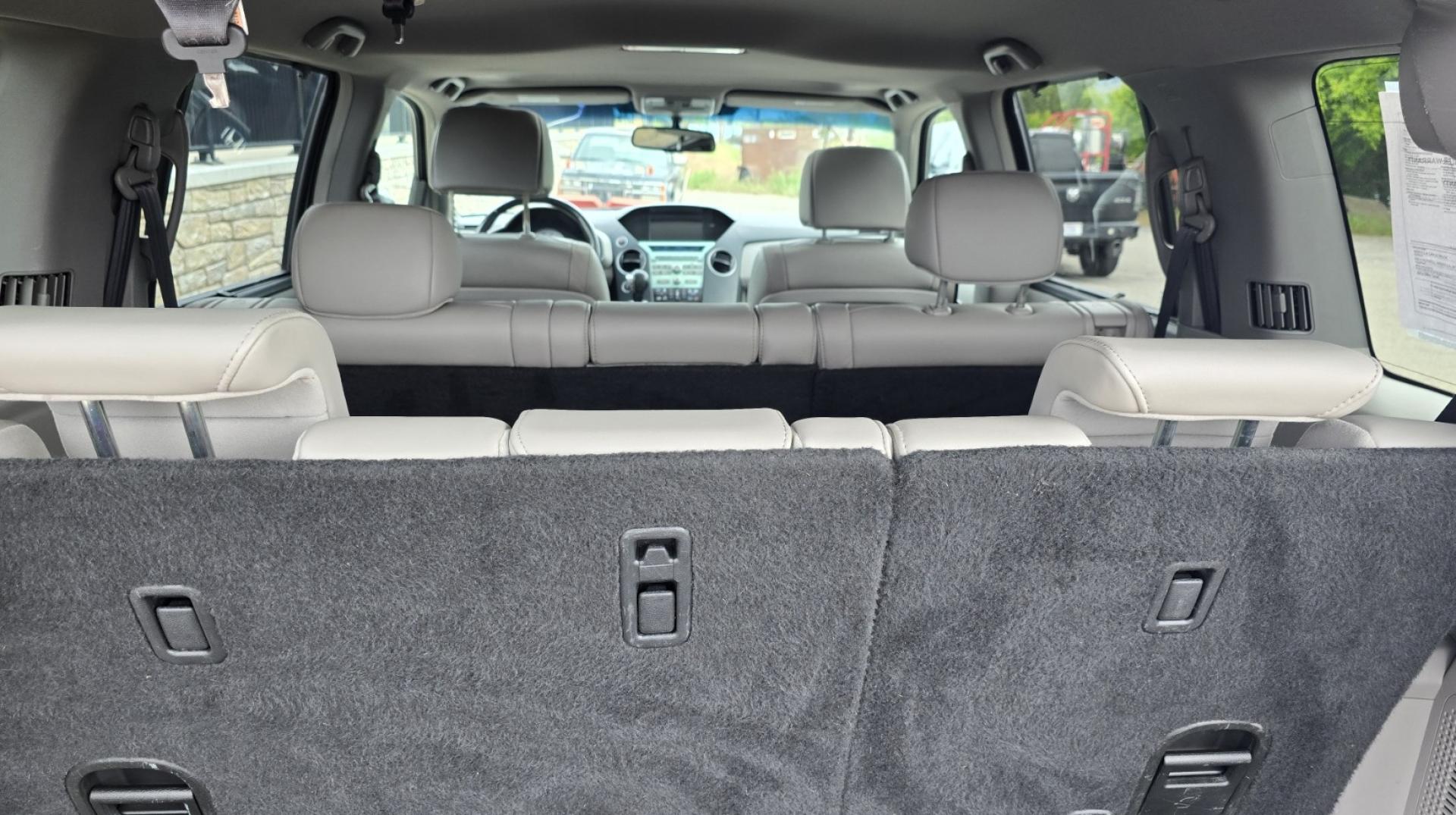 2009 Grey /Black Honda Pilot Touring 4WD (5FNYF48819B) with an 3.5L V6 SOHC 24V engine, 5-Speed Automatic transmission, located at 450 N Russell, Missoula, MT, 59801, (406) 543-6600, 46.874496, -114.017433 - 2 Owner Honda AWD SUV. 3.5L V6 Engine. Automatic Transmission. 3rd Row Seating. Heated Power Front Seats. Power Sunroof. AM FM CD Player. Air. Cruise. Tilt. Bluetooth Phone Connection. Power Liftgate. New Tires. Catalytic converter replaced 30K miles ago. We Finance through local Credit Unions. - Photo#10