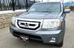 2009 Grey /Black Honda Pilot Touring 4WD (5FNYF48819B) with an 3.5L V6 SOHC 24V engine, 5-Speed Automatic transmission, located at 450 N Russell, Missoula, MT, 59801, (406) 543-6600, 46.874496, -114.017433 - 2 Owner Honda AWD SUV. 3.5L V6 Engine. Automatic Transmission. 3rd Row Seating. Heated Power Front Seats. Power Sunroof. AM FM CD Player. Air. Cruise. Tilt. Bluetooth Phone Connection. Power Liftgate. New Tires. Catalytic converter replaced 30K miles ago. We Finance through local Credit Unions. - Photo#5