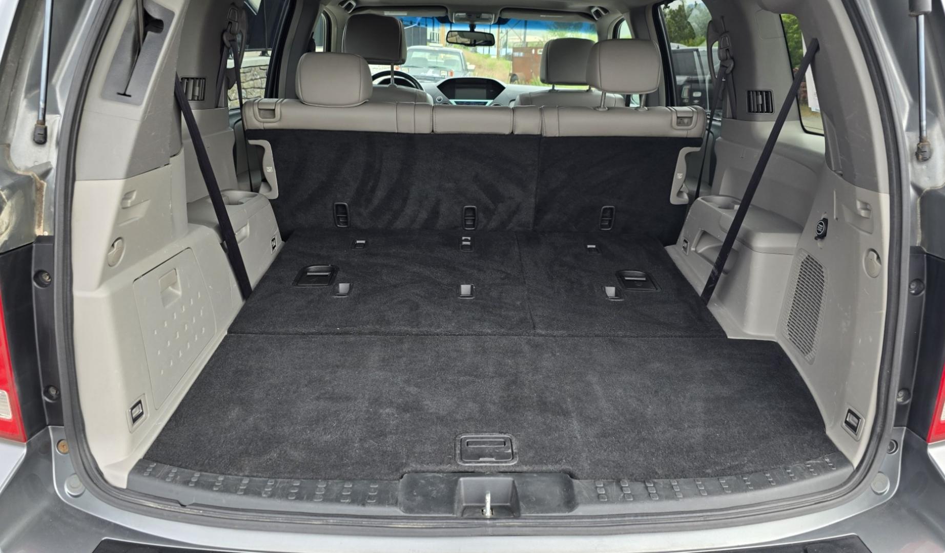 2009 Grey /Black Honda Pilot Touring 4WD (5FNYF48819B) with an 3.5L V6 SOHC 24V engine, 5-Speed Automatic transmission, located at 450 N Russell, Missoula, MT, 59801, (406) 543-6600, 46.874496, -114.017433 - 2 Owner Honda AWD SUV. 3.5L V6 Engine. Automatic Transmission. 3rd Row Seating. Heated Power Front Seats. Power Sunroof. AM FM CD Player. Air. Cruise. Tilt. Bluetooth Phone Connection. Power Liftgate. New Tires. Catalytic converter replaced 30K miles ago. We Finance through local Credit Unions. - Photo#11