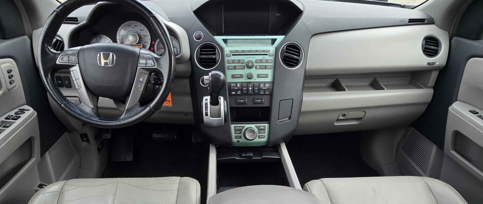 2009 Grey /Black Honda Pilot Touring 4WD (5FNYF48819B) with an 3.5L V6 SOHC 24V engine, 5-Speed Automatic transmission, located at 450 N Russell, Missoula, MT, 59801, (406) 543-6600, 46.874496, -114.017433 - 2 Owner Honda AWD SUV. 3.5L V6 Engine. Automatic Transmission. 3rd Row Seating. Heated Power Front Seats. Power Sunroof. AM FM CD Player. Air. Cruise. Tilt. Bluetooth Phone Connection. Power Liftgate. New Tires. Catalytic converter replaced 30K miles ago. We Finance through local Credit Unions. - Photo#17