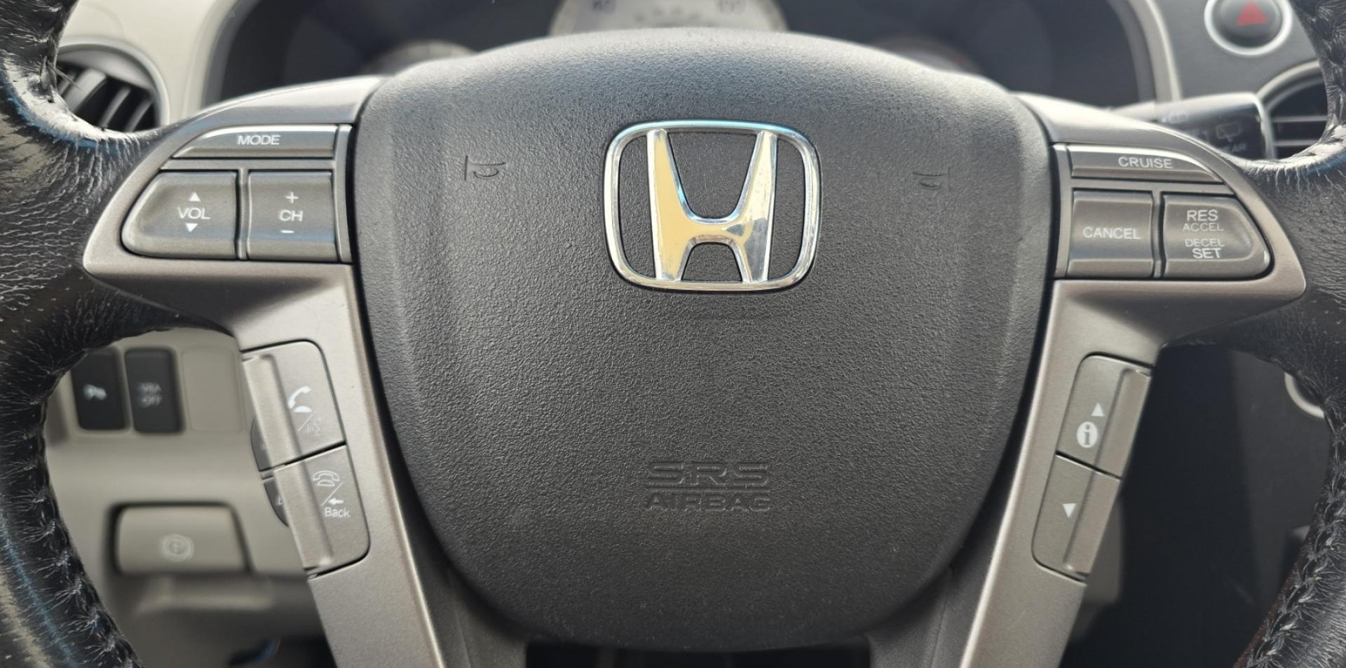 2009 Grey /Black Honda Pilot Touring 4WD (5FNYF48819B) with an 3.5L V6 SOHC 24V engine, 5-Speed Automatic transmission, located at 450 N Russell, Missoula, MT, 59801, (406) 543-6600, 46.874496, -114.017433 - 2 Owner Honda AWD SUV. 3.5L V6 Engine. Automatic Transmission. 3rd Row Seating. Heated Power Front Seats. Power Sunroof. AM FM CD Player. Air. Cruise. Tilt. Bluetooth Phone Connection. Power Liftgate. New Tires. Catalytic converter replaced 30K miles ago. We Finance through local Credit Unions. - Photo#20