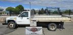 2000 White /Blue Chevrolet C/K 3500 Reg. Cab 2WD (1GBKC34J4YF) with an 7.4L V8 OHV 16V engine, Automatic transmission, located at 450 N Russell, Missoula, MT, 59801, (406) 543-6600, 46.874496, -114.017433 - Beefy One Ton Chevy Dually with the Powerful 7.4L V8 Engine. Automatic Transmission. Rear Wheel Drive. Massive Aluminum Flatbed measuring 8 Feet Wide by just under 12 feet long. Hydraulic Lift raises the Flatbed almost vertical. Air Conditioning. Blows Cold. AM FM Radio. Dual Gas Tanks. Not a lot of - Photo#6