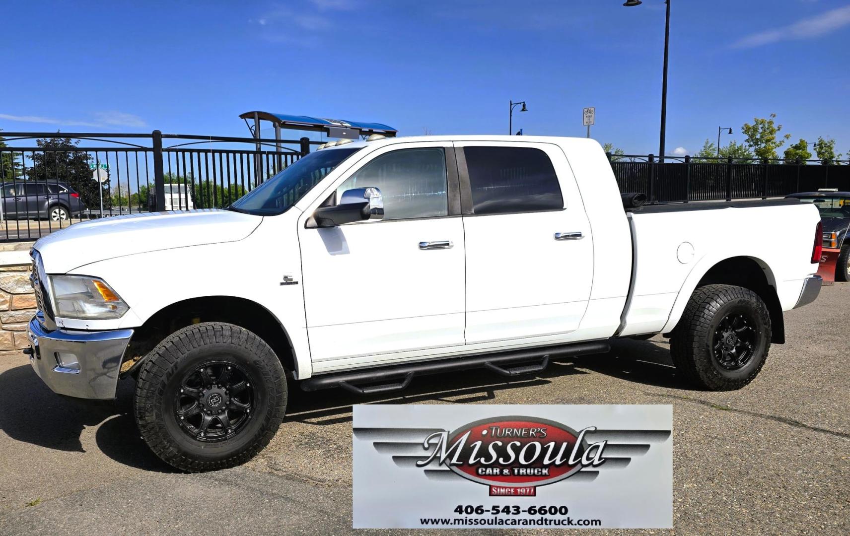 2012 White /Black Dodge Ram 3500 Laramie Longhorn Edition Mega Cab 4WD (3C63D3NL9CG) with an 6.7L L6 OHV 24V TURBO DIESEL engine, 6-Speed Automatic transmission, located at 450 N Russell, Missoula, MT, 59801, (406) 543-6600, 46.874496, -114.017433 - Another Beast of a Truck with Many Upgrades. 6.7L Cummins Diesel Engine. 6 Speed Automatic Transmission. 4WD. Front and Rear Heated Seats. Power Memory Front Seats, Cooled Front Seats. Heated Steering Wheel. AM FM CD Player. Bluetooth Audio and Phones. Front and Rear Climate Control. Backup Camera. - Photo#2
