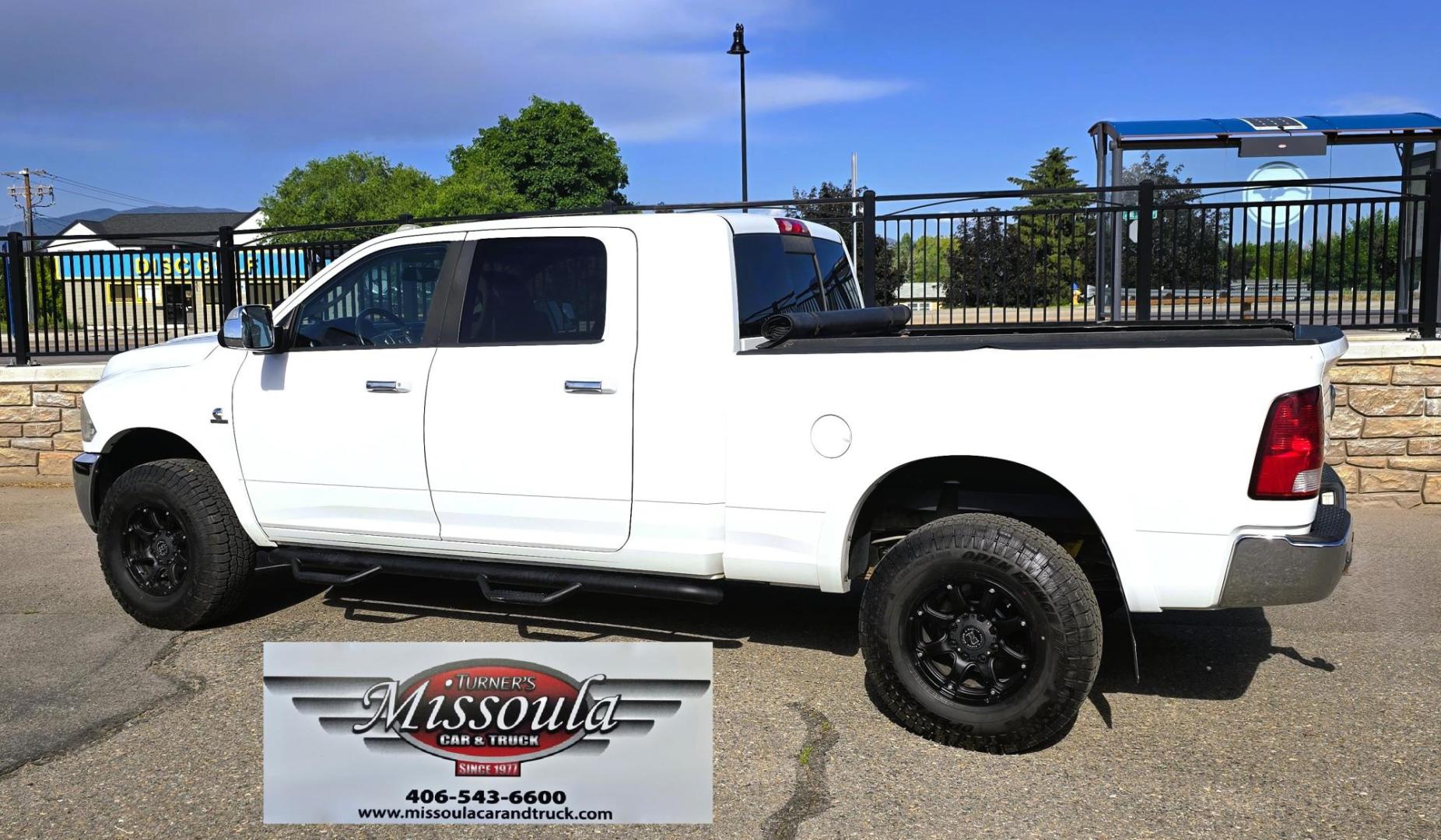 2012 White /Black Dodge Ram 3500 Laramie Longhorn Edition Mega Cab 4WD (3C63D3NL9CG) with an 6.7L L6 OHV 24V TURBO DIESEL engine, 6-Speed Automatic transmission, located at 450 N Russell, Missoula, MT, 59801, (406) 543-6600, 46.874496, -114.017433 - Another Beast of a Truck with Many Upgrades. 6.7L Cummins Diesel Engine. 6 Speed Automatic Transmission. 4WD. Front and Rear Heated Seats. Power Memory Front Seats, Cooled Front Seats. Heated Steering Wheel. AM FM CD Player. Bluetooth Audio and Phones. Front and Rear Climate Control. Backup Camera. - Photo#1
