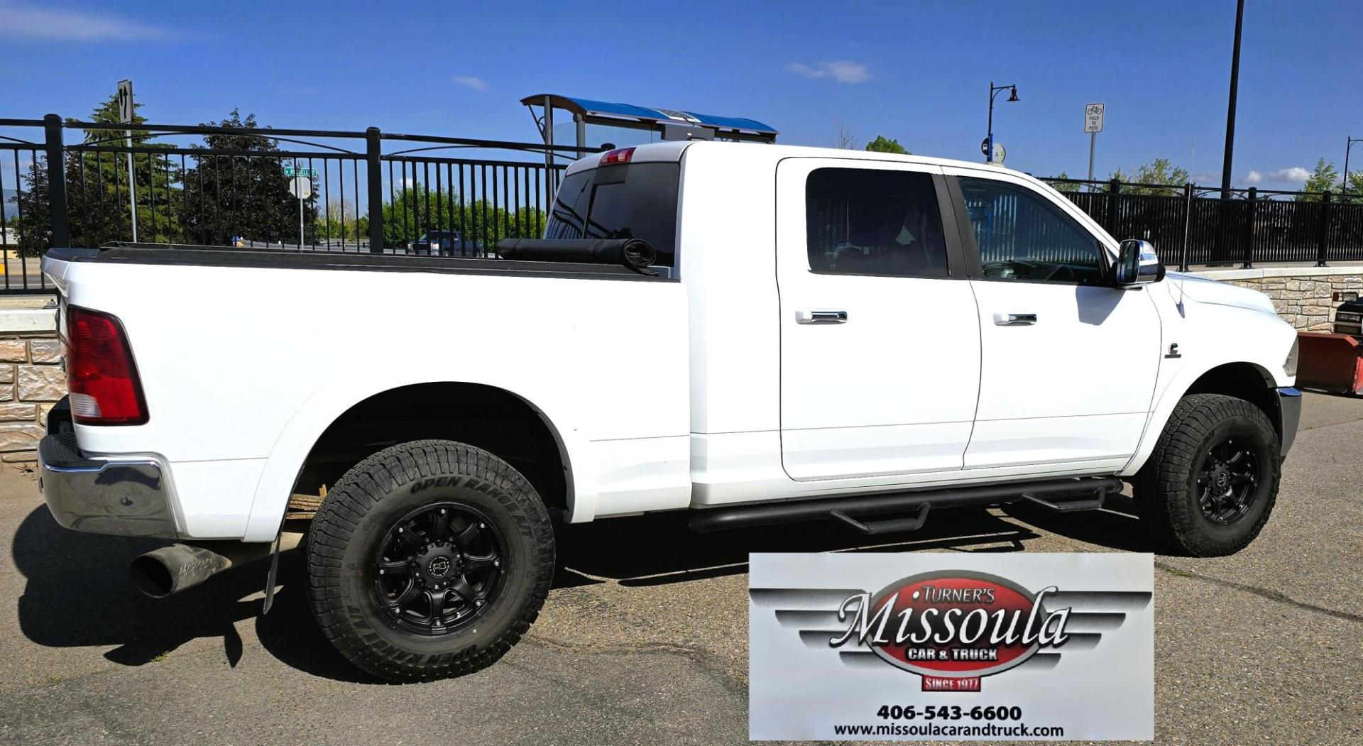 2012 White /Black Dodge Ram 3500 Laramie Longhorn Edition Mega Cab 4WD (3C63D3NL9CG) with an 6.7L L6 OHV 24V TURBO DIESEL engine, 6-Speed Automatic transmission, located at 450 N Russell, Missoula, MT, 59801, (406) 543-6600, 46.874496, -114.017433 - Another Beast of a Truck with Many Upgrades. 6.7L Cummins Diesel Engine. 6 Speed Automatic Transmission. 4WD. Front and Rear Heated Seats. Power Memory Front Seats, Cooled Front Seats. Heated Steering Wheel. AM FM CD Player. Bluetooth Audio and Phones. Front and Rear Climate Control. Backup Camera. - Photo#5