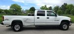 2002 White /Black GMC Sierra 2500HD SL Crew Cab Long Bed 4WD (1GTHK23192F) with an 6.6L V8 OHV 32V TURBO DIESEL engine, Automatic transmission, located at 450 N Russell, Missoula, MT, 59801, (406) 543-6600, 46.874496, -114.017433 - Discount Special. PLEASE READ! Strong running 6.6L Duramax Diesel V8 Engine. Automatic Transmission. Long Bed. 4WD. Transmission works fine as does the Four Wheel Drive. Has good Tires. AM FM Stereo. Power Windows and Locks. Does need some work, but the price reflects that. Has a power steering lea - Photo#0