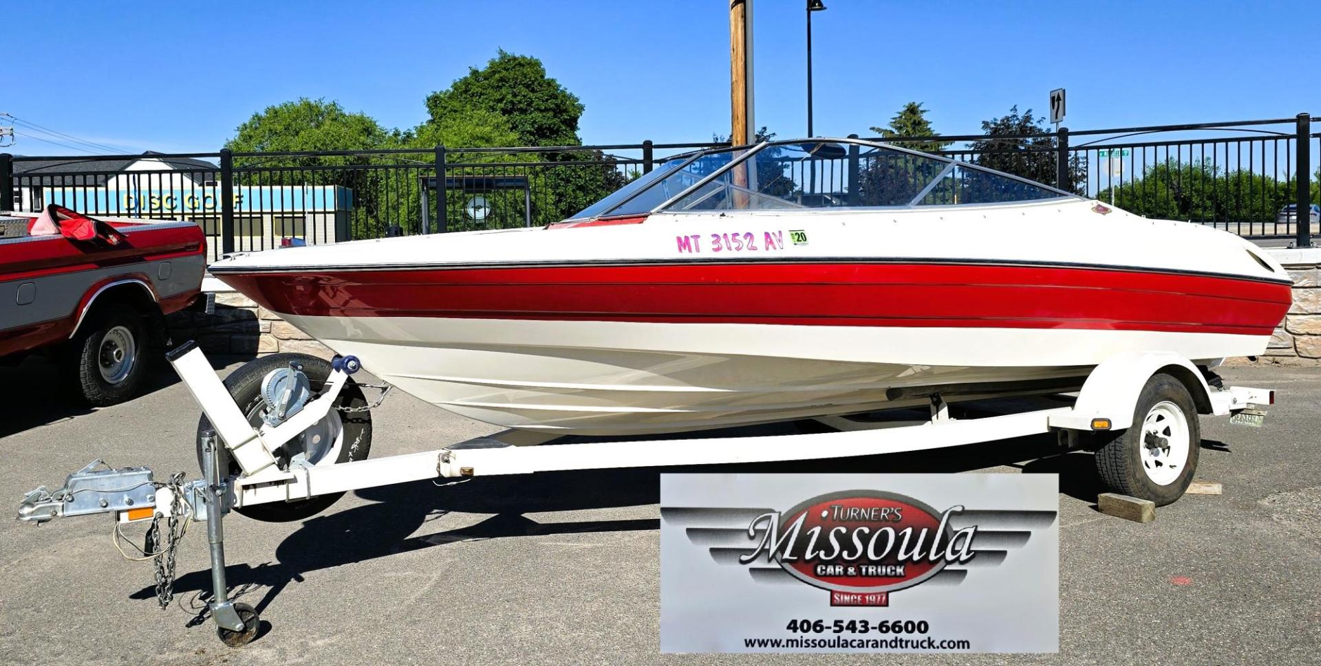 1996 Red and White /Red and White Bayliner 40th Anniversary with an 5.7L V8 engine, Manual transmission, located at 450 N Russell, Missoula, MT, 59801, (406) 543-6600, 46.874496, -114.017433 - Beautiful 20.5 Foot Bayliner 40th Anniversary Edition. Powerful 5.7L V8 MerCruiser Engine with only 531 Hours on it. Interior is near perfect. Comes with Alpine Stereo and a Fish Finder. Nice 2001 Osco Trailer. Built in Gas Tank and Live Well. Has a Good Cover to keep the seats clean and dry. Bank - Photo#2