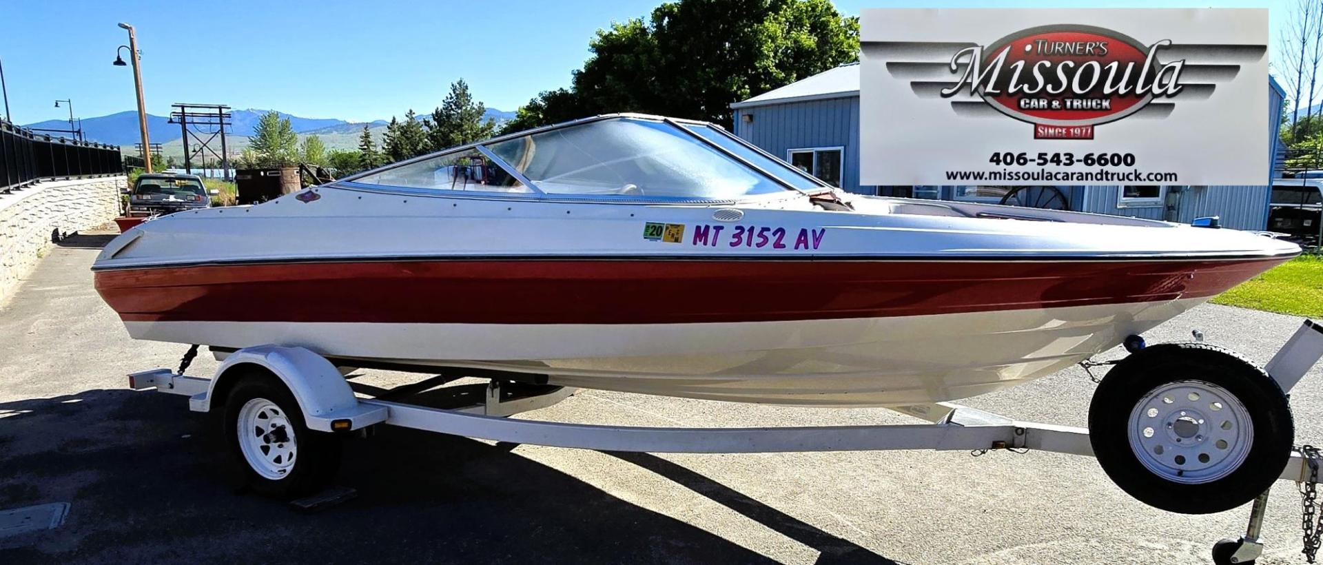 1996 Red and White /Red and White Bayliner 40th Anniversary with an 5.7L V8 engine, Manual transmission, located at 450 N Russell, Missoula, MT, 59801, (406) 543-6600, 46.874496, -114.017433 - Beautiful 20.5 Foot Bayliner 40th Anniversary Edition. Powerful 5.7L V8 MerCruiser Engine with only 531 Hours on it. Interior is near perfect. Comes with Alpine Stereo and a Fish Finder. Nice 2001 Osco Trailer. Built in Gas Tank and Live Well. Has a Good Cover to keep the seats clean and dry. Bank - Photo#4