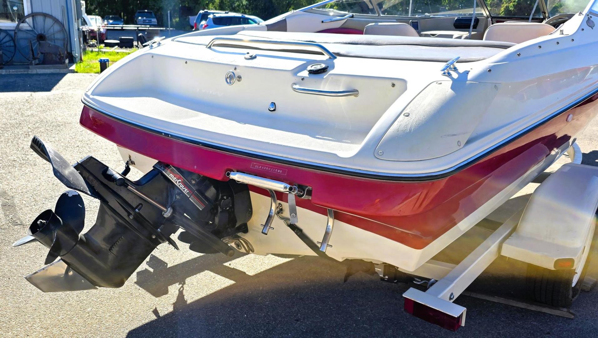 1996 Red and White /Red and White Bayliner 40th Anniversary with an 5.7L V8 engine, Manual transmission, located at 450 N Russell, Missoula, MT, 59801, (406) 543-6600, 46.874496, -114.017433 - Beautiful 20.5 Foot Bayliner 40th Anniversary Edition. Powerful 5.7L V8 MerCruiser Engine with only 531 Hours on it. Interior is near perfect. Comes with Alpine Stereo and a Fish Finder. Nice 2001 Osco Trailer. Built in Gas Tank and Live Well. Has a Good Cover to keep the seats clean and dry. Bank - Photo#6