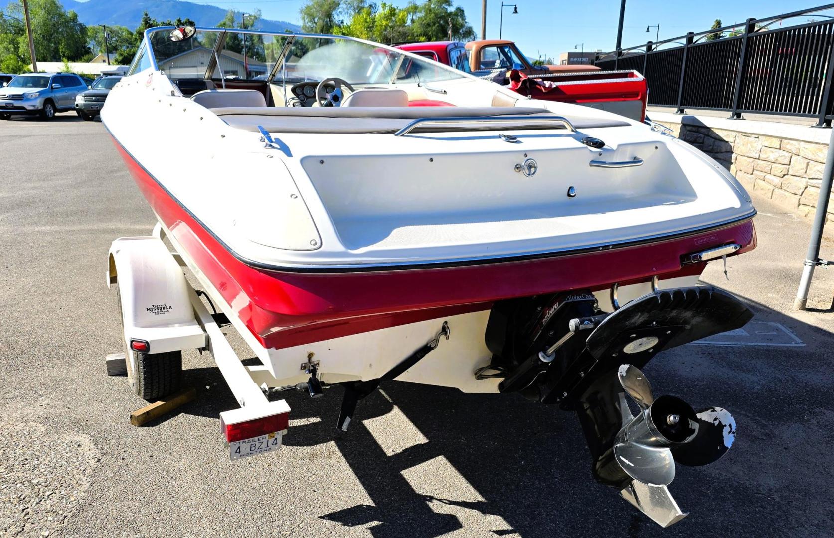 1996 Red and White /Red and White Bayliner 40th Anniversary with an 5.7L V8 engine, Manual transmission, located at 450 N Russell, Missoula, MT, 59801, (406) 543-6600, 46.874496, -114.017433 - Beautiful 20.5 Foot Bayliner 40th Anniversary Edition. Powerful 5.7L V8 MerCruiser Engine with only 531 Hours on it. Interior is near perfect. Comes with Alpine Stereo and a Fish Finder. Nice 2001 Osco Trailer. Built in Gas Tank and Live Well. Has a Good Cover to keep the seats clean and dry. Bank - Photo#5