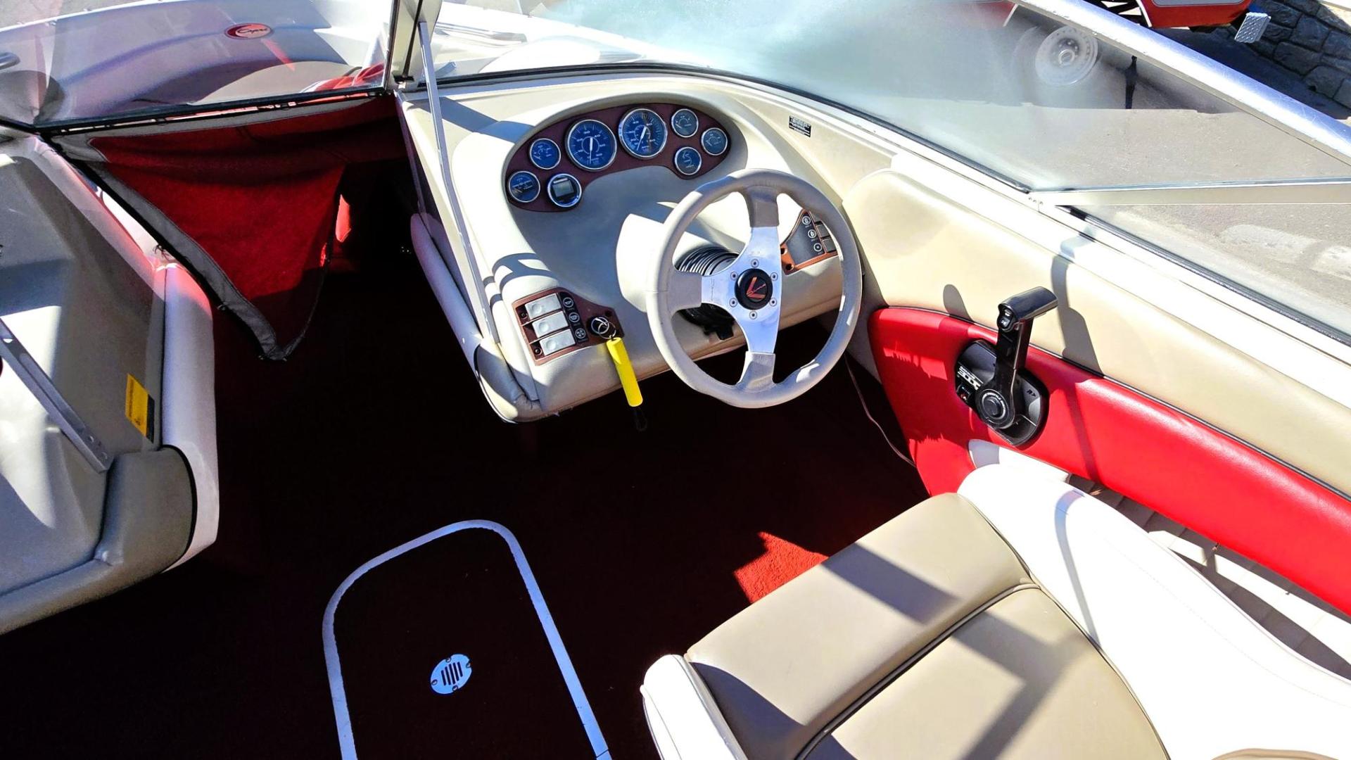 1996 Red and White /Red and White Bayliner 40th Anniversary with an 5.7L V8 engine, Manual transmission, located at 450 N Russell, Missoula, MT, 59801, (406) 543-6600, 46.874496, -114.017433 - Beautiful 20.5 Foot Bayliner 40th Anniversary Edition. Powerful 5.7L V8 MerCruiser Engine with only 531 Hours on it. Interior is near perfect. Comes with Alpine Stereo and a Fish Finder. Nice 2001 Osco Trailer. Built in Gas Tank and Live Well. Has a Good Cover to keep the seats clean and dry. Bank - Photo#10