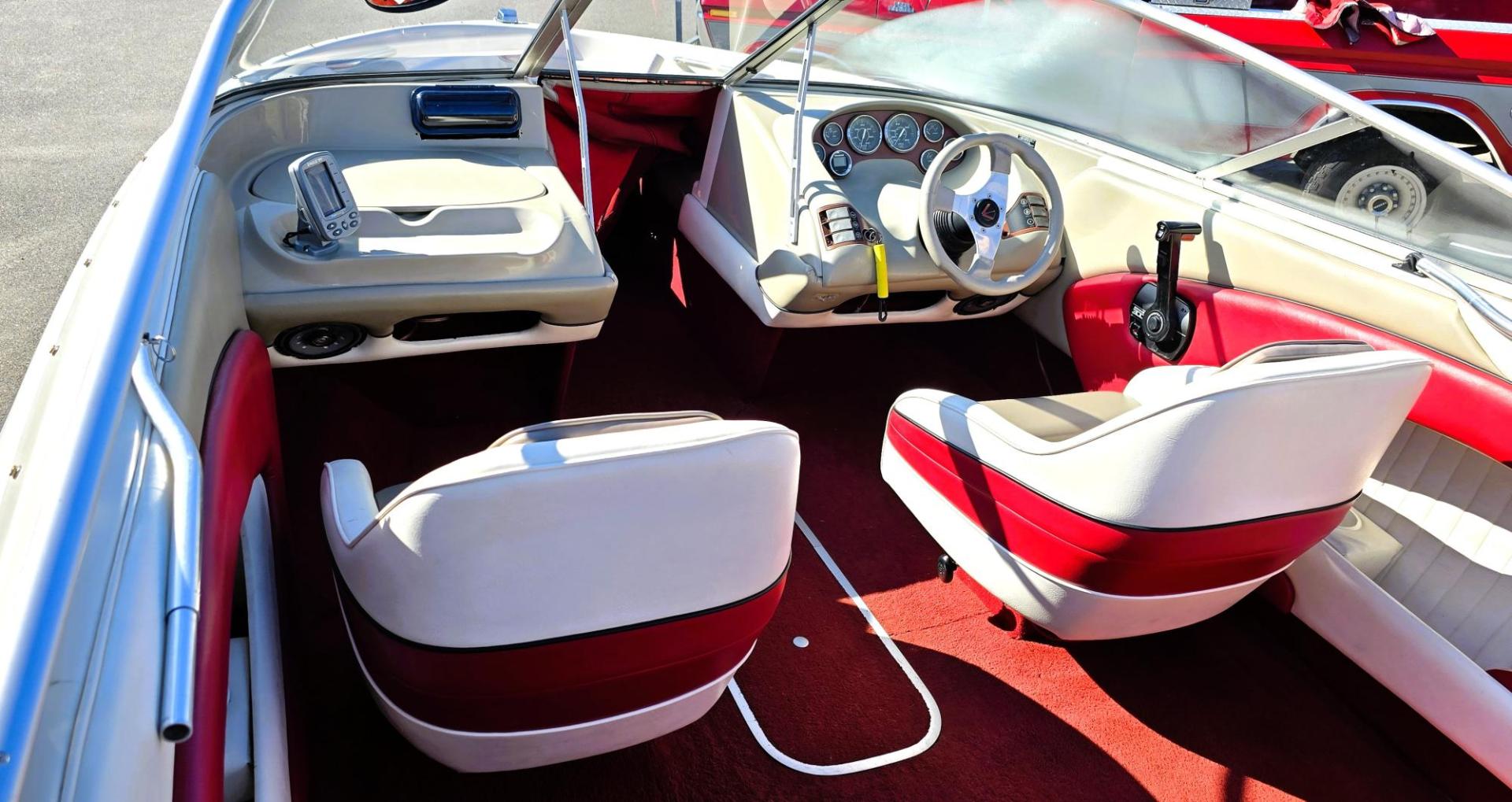 1996 Red and White /Red and White Bayliner 40th Anniversary with an 5.7L V8 engine, Manual transmission, located at 450 N Russell, Missoula, MT, 59801, (406) 543-6600, 46.874496, -114.017433 - Beautiful 20.5 Foot Bayliner 40th Anniversary Edition. Powerful 5.7L V8 MerCruiser Engine with only 531 Hours on it. Interior is near perfect. Comes with Alpine Stereo and a Fish Finder. Nice 2001 Osco Trailer. Built in Gas Tank and Live Well. Has a Good Cover to keep the seats clean and dry. Bank - Photo#8