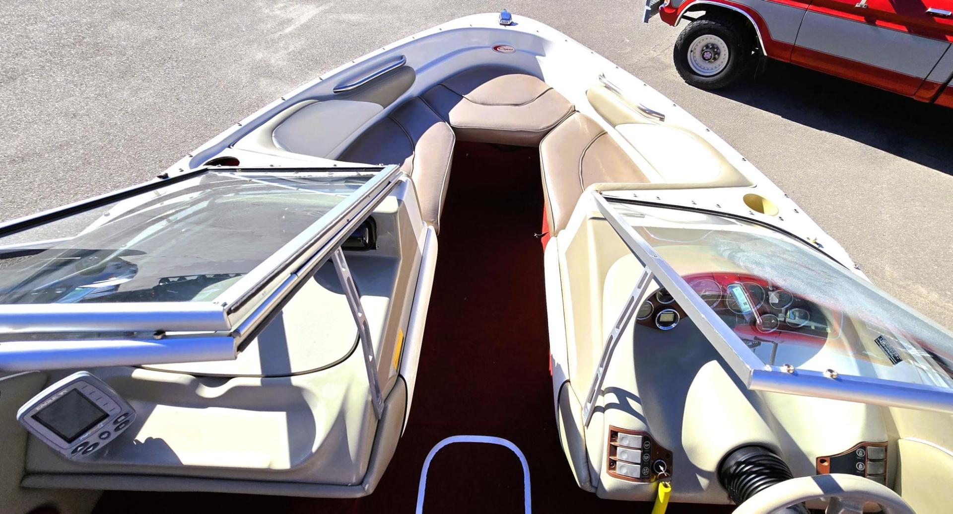 1996 Red and White /Red and White Bayliner 40th Anniversary with an 5.7L V8 engine, Manual transmission, located at 450 N Russell, Missoula, MT, 59801, (406) 543-6600, 46.874496, -114.017433 - Beautiful 20.5 Foot Bayliner 40th Anniversary Edition. Powerful 5.7L V8 MerCruiser Engine with only 531 Hours on it. Interior is near perfect. Comes with Alpine Stereo and a Fish Finder. Nice 2001 Osco Trailer. Built in Gas Tank and Live Well. Has a Good Cover to keep the seats clean and dry. Bank - Photo#11