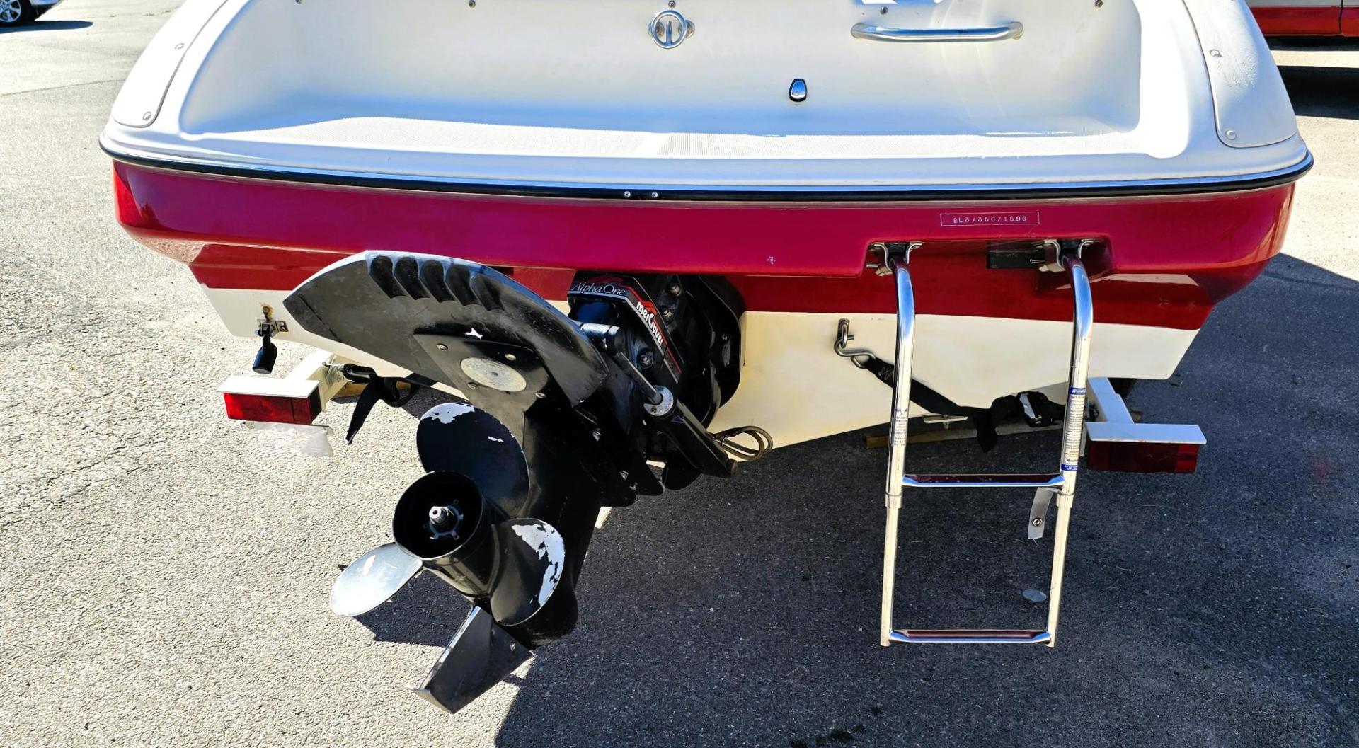 1996 Red and White /Red and White Bayliner 40th Anniversary with an 5.7L V8 engine, Manual transmission, located at 450 N Russell, Missoula, MT, 59801, (406) 543-6600, 46.874496, -114.017433 - Beautiful 20.5 Foot Bayliner 40th Anniversary Edition. Powerful 5.7L V8 MerCruiser Engine with only 531 Hours on it. Interior is near perfect. Comes with Alpine Stereo and a Fish Finder. Nice 2001 Osco Trailer. Built in Gas Tank and Live Well. Has a Good Cover to keep the seats clean and dry. Bank - Photo#18