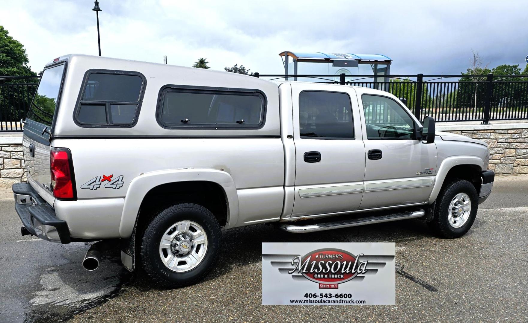 2005 Pewter /Gray Chevrolet Silverado 2500HD LT Crew Cab 4WD (1GCHK23265F) with an 6.6L V8 OHV 32V TURBO DIESEL engine, Automatic transmission, located at 450 N Russell, Missoula, MT, 59801, (406) 543-6600, 46.874496, -114.017433 - Strong Running 3/4 Ton Chevy with 6.6L V8 Duramax Diesel. Allison Automatic Transmission. Matching Topper. Heated Power Front Seats. Power Windows and Locks. Air. Cruise. Tilt. AM FM CD Player. Truck has a couple dents and a little rust and the price reflects that. Because of the age, our lender - Photo#1