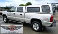2005 Pewter /Gray Chevrolet Silverado 2500HD LT Crew Cab 4WD (1GCHK23265F) with an 6.6L V8 OHV 32V TURBO DIESEL engine, Automatic transmission, located at 450 N Russell, Missoula, MT, 59801, (406) 543-6600, 46.874496, -114.017433 - Strong Running 3/4 Ton Chevy with 6.6L V8 Duramax Diesel. Allison Automatic Transmission. Matching Topper. Heated Power Front Seats. Power Windows and Locks. Air. Cruise. Tilt. AM FM CD Player. Truck has a couple dents and a little rust and the price reflects that. Because of the age, our lender - Photo#7