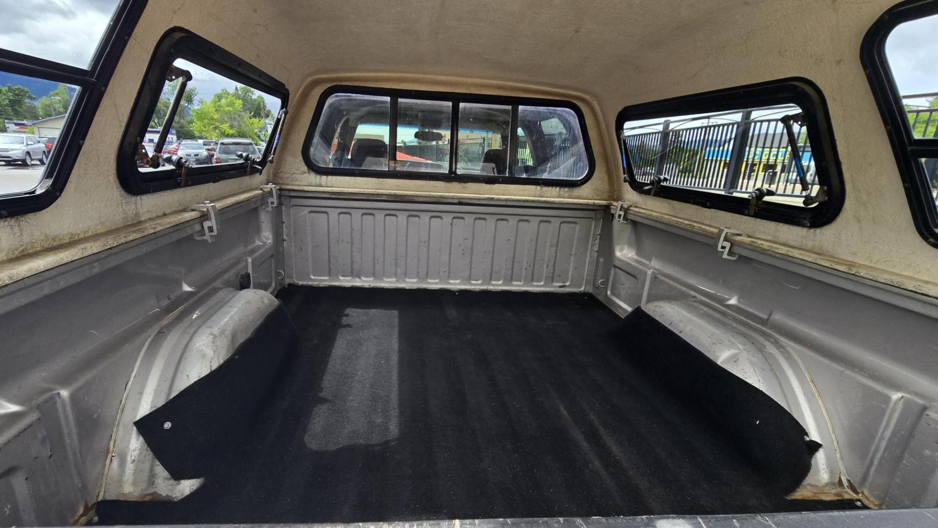 2005 Pewter /Gray Chevrolet Silverado 2500HD LT Crew Cab 4WD (1GCHK23265F) with an 6.6L V8 OHV 32V TURBO DIESEL engine, Automatic transmission, located at 450 N Russell, Missoula, MT, 59801, (406) 543-6600, 46.874496, -114.017433 - Strong Running 3/4 Ton Chevy with 6.6L V8 Duramax Diesel. Allison Automatic Transmission. Matching Topper. Heated Power Front Seats. Power Windows and Locks. Air. Cruise. Tilt. AM FM CD Player. Truck has a couple dents and a little rust and the price reflects that. Because of the age, our lender - Photo#12