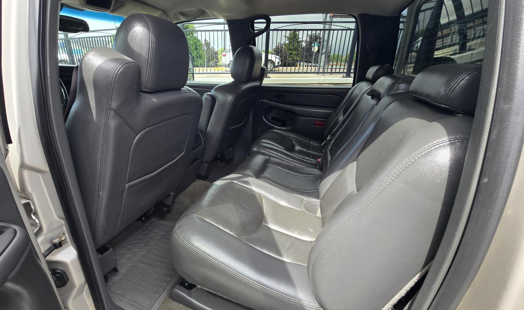 2005 Pewter /Gray Chevrolet Silverado 2500HD LT Crew Cab 4WD (1GCHK23265F) with an 6.6L V8 OHV 32V TURBO DIESEL engine, Automatic transmission, located at 450 N Russell, Missoula, MT, 59801, (406) 543-6600, 46.874496, -114.017433 - Strong Running 3/4 Ton Chevy with 6.6L V8 Duramax Diesel. Allison Automatic Transmission. Matching Topper. Heated Power Front Seats. Power Windows and Locks. Air. Cruise. Tilt. AM FM CD Player. Truck has a couple dents and a little rust and the price reflects that. Because of the age, our lender - Photo#13