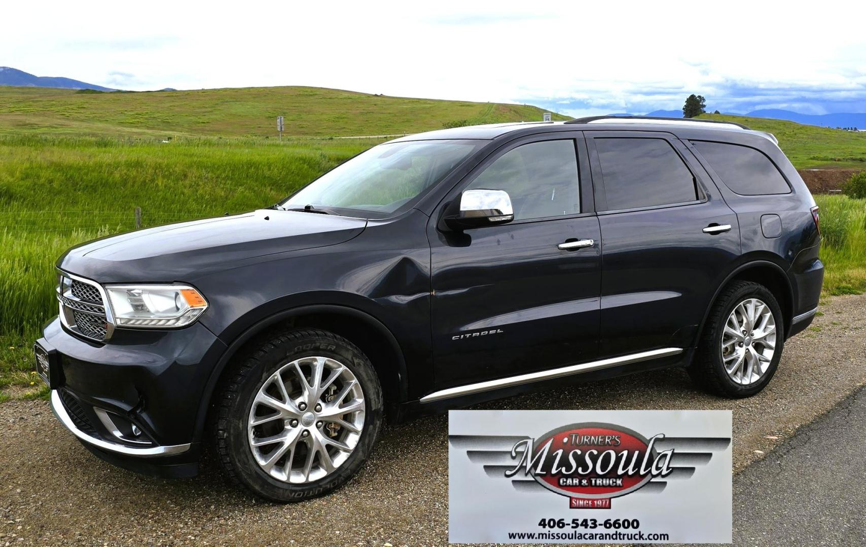 2014 Blue /Black Dodge Durango Citadel AWD (1C4SDJET1EC) with an 5.7L V8 OHV 16V engine, 8-Speed Automatic transmission, located at 450 N Russell, Missoula, MT, 59801, (406) 543-6600, 46.874496, -114.017433 - Loaded AWD Durango SUV. Powerful 5.7 Hemi V8 Engine. 8 Speed Automatic Transmission. Third Row Seating. Sunroof. Front and Middle Heated Seats. Cooled Front Seats. Heated Steering Wheel. Backup Camera. AM FM SAT CD Player. Bluetooth Audio and Phone Connection. Newly Serviced Air Conditioning. Cruise - Photo#1