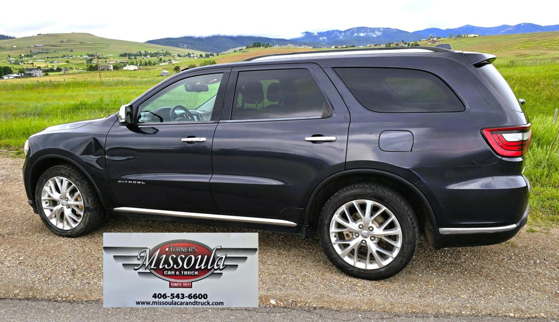 2014 Blue /Black Dodge Durango Citadel AWD (1C4SDJET1EC) with an 5.7L V8 OHV 16V engine, 8-Speed Automatic transmission, located at 450 N Russell, Missoula, MT, 59801, (406) 543-6600, 46.874496, -114.017433 - Loaded AWD Durango SUV. Powerful 5.7 Hemi V8 Engine. 8 Speed Automatic Transmission. Third Row Seating. Sunroof. Front and Middle Heated Seats. Cooled Front Seats. Heated Steering Wheel. Backup Camera. AM FM SAT CD Player. Bluetooth Audio and Phone Connection. Newly Serviced Air Conditioning. Cruise - Photo#2