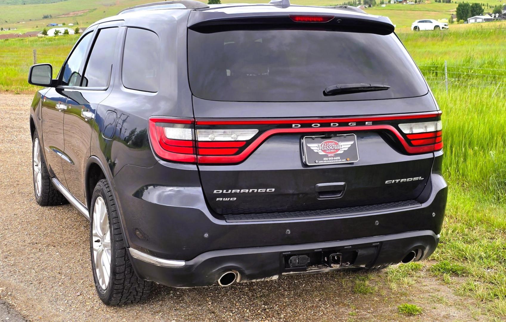 2014 Blue /Black Dodge Durango Citadel AWD (1C4SDJET1EC) with an 5.7L V8 OHV 16V engine, 8-Speed Automatic transmission, located at 450 N Russell, Missoula, MT, 59801, (406) 543-6600, 46.874496, -114.017433 - Loaded AWD Durango SUV. Powerful 5.7 Hemi V8 Engine. 8 Speed Automatic Transmission. Third Row Seating. Sunroof. Front and Middle Heated Seats. Cooled Front Seats. Heated Steering Wheel. Backup Camera. AM FM SAT CD Player. Bluetooth Audio and Phone Connection. Newly Serviced Air Conditioning. Cruise - Photo#4