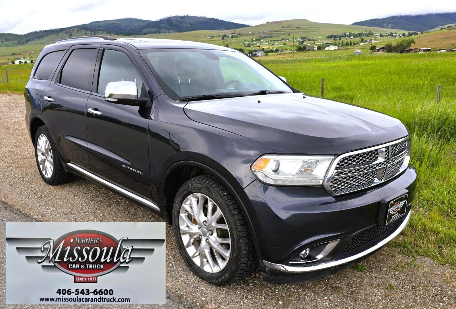 2014 Blue /Black Dodge Durango Citadel AWD (1C4SDJET1EC) with an 5.7L V8 OHV 16V engine, 8-Speed Automatic transmission, located at 450 N Russell, Missoula, MT, 59801, (406) 543-6600, 46.874496, -114.017433 - Loaded AWD Durango SUV. Powerful 5.7 Hemi V8 Engine. 8 Speed Automatic Transmission. Third Row Seating. Sunroof. Front and Middle Heated Seats. Cooled Front Seats. Heated Steering Wheel. Backup Camera. AM FM SAT CD Player. Bluetooth Audio and Phone Connection. Newly Serviced Air Conditioning. Cruise - Photo#5