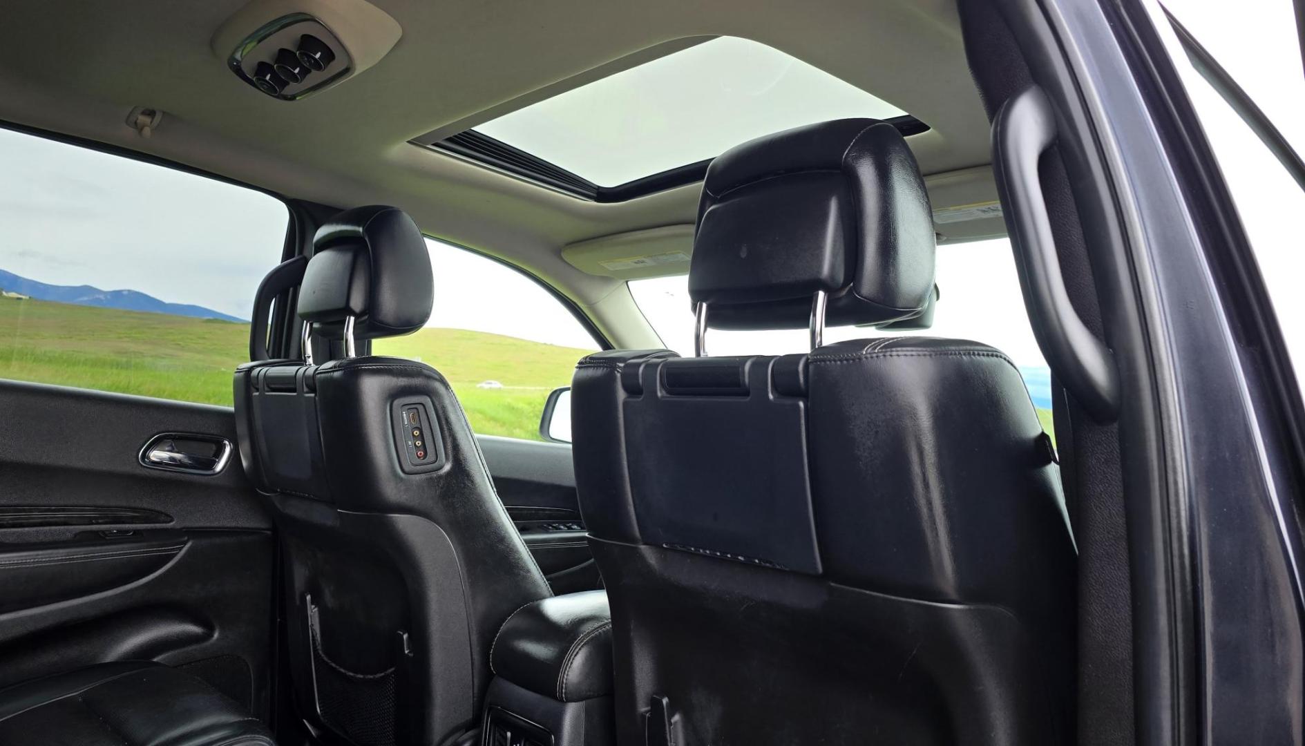 2014 Blue /Black Dodge Durango Citadel AWD (1C4SDJET1EC) with an 5.7L V8 OHV 16V engine, 8-Speed Automatic transmission, located at 450 N Russell, Missoula, MT, 59801, (406) 543-6600, 46.874496, -114.017433 - Loaded AWD Durango SUV. Powerful 5.7 Hemi V8 Engine. 8 Speed Automatic Transmission. Third Row Seating. Sunroof. Front and Middle Heated Seats. Cooled Front Seats. Heated Steering Wheel. Backup Camera. AM FM SAT CD Player. Bluetooth Audio and Phone Connection. Newly Serviced Air Conditioning. Cruise - Photo#14