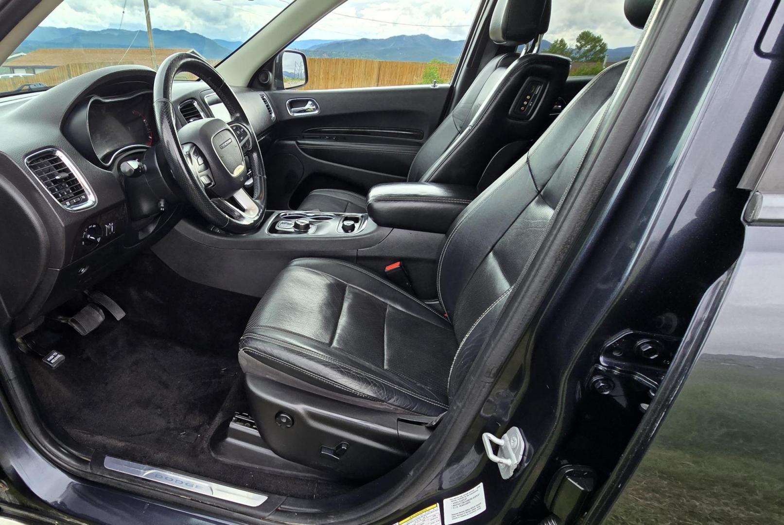 2014 Blue /Black Dodge Durango Citadel AWD (1C4SDJET1EC) with an 5.7L V8 OHV 16V engine, 8-Speed Automatic transmission, located at 450 N Russell, Missoula, MT, 59801, (406) 543-6600, 46.874496, -114.017433 - Loaded AWD Durango SUV. Powerful 5.7 Hemi V8 Engine. 8 Speed Automatic Transmission. Third Row Seating. Sunroof. Front and Middle Heated Seats. Cooled Front Seats. Heated Steering Wheel. Backup Camera. AM FM SAT CD Player. Bluetooth Audio and Phone Connection. Newly Serviced Air Conditioning. Cruise - Photo#17