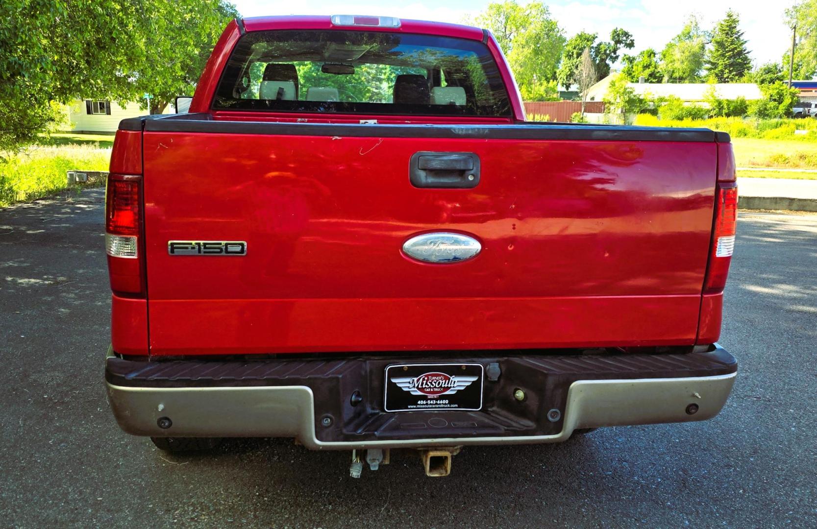 2006 Red /Tan Ford F-150 Lariat SuperCrew (1FTPW14536F) with an 5.4L V6 SOHC 16V engine, 4-Speed Automatic Overdrive transmission, located at 450 N Russell, Missoula, MT, 59801, (406) 543-6600, 46.874496, -114.017433 - Yes it's a lot of miles but it runs great! Reliable 5.4L V8 Engine. Automatic Transmission. 4WD. Power Heated Front Seats. AM FM CD Player. Power Windows and Locks. Air. Cruise. Tilt. Rear Entertainment. Running Boards. The hood and right front fender have some severe scratches from what appears to - Photo#4