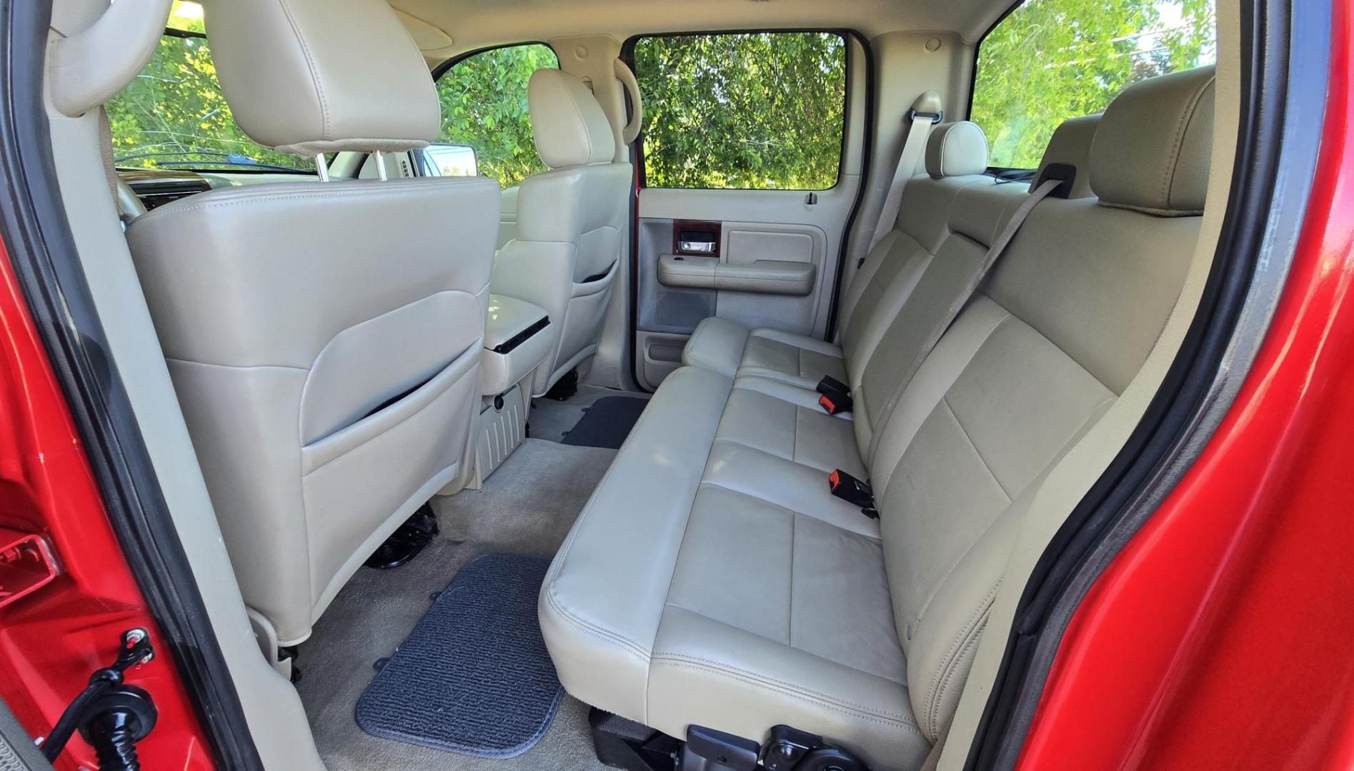 2006 Red /Tan Ford F-150 Lariat SuperCrew (1FTPW14536F) with an 5.4L V6 SOHC 16V engine, 4-Speed Automatic Overdrive transmission, located at 450 N Russell, Missoula, MT, 59801, (406) 543-6600, 46.874496, -114.017433 - Yes it's a lot of miles but it runs great! Reliable 5.4L V8 Engine. Automatic Transmission. 4WD. Power Heated Front Seats. AM FM CD Player. Power Windows and Locks. Air. Cruise. Tilt. Rear Entertainment. Running Boards. The hood and right front fender have some severe scratches from what appears to - Photo#11