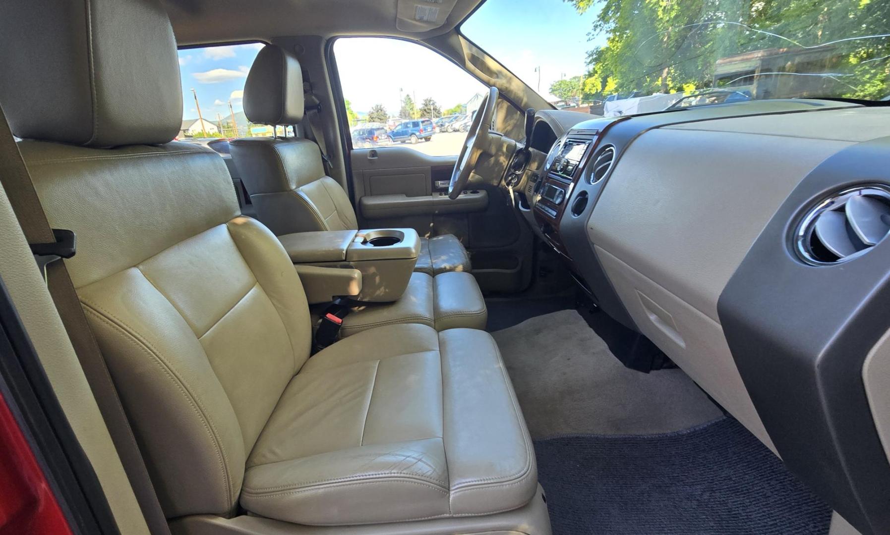 2006 Red /Tan Ford F-150 Lariat SuperCrew (1FTPW14536F) with an 5.4L V6 SOHC 16V engine, 4-Speed Automatic Overdrive transmission, located at 450 N Russell, Missoula, MT, 59801, (406) 543-6600, 46.874496, -114.017433 - Yes it's a lot of miles but it runs great! Reliable 5.4L V8 Engine. Automatic Transmission. 4WD. Power Heated Front Seats. AM FM CD Player. Power Windows and Locks. Air. Cruise. Tilt. Rear Entertainment. Running Boards. The hood and right front fender have some severe scratches from what appears to - Photo#13