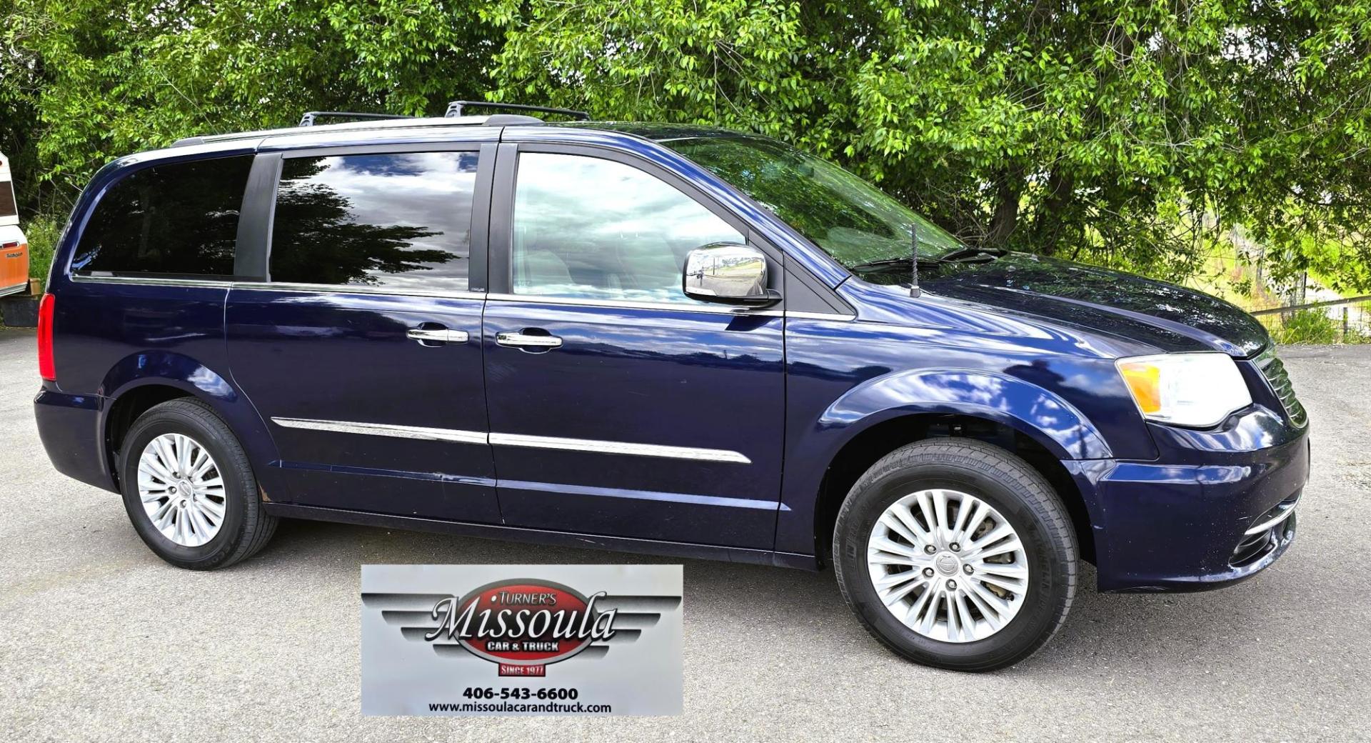 2013 Blue /Tan Chrysler Town & Country Limited (2C4RC1GG7DR) with an 3.6L V6 DOHC 24V engine, 6-Speed Automatic transmission, located at 450 N Russell, Missoula, MT, 59801, (406) 543-6600, 46.874496, -114.017433 - 2013 Town and Country FWD Mini-Van. These are getting hard to come by. This particular one has many features. 3.6L V6 Engine. 3rd Row Seating. Heated Front and Middle Seats. Heated Steering Wheel. DVD Entertainment System for the 2nd and 3rd Rows. Navigation. Bluetooth. AM FM SAT CD Player. Power Sl- Photo#1