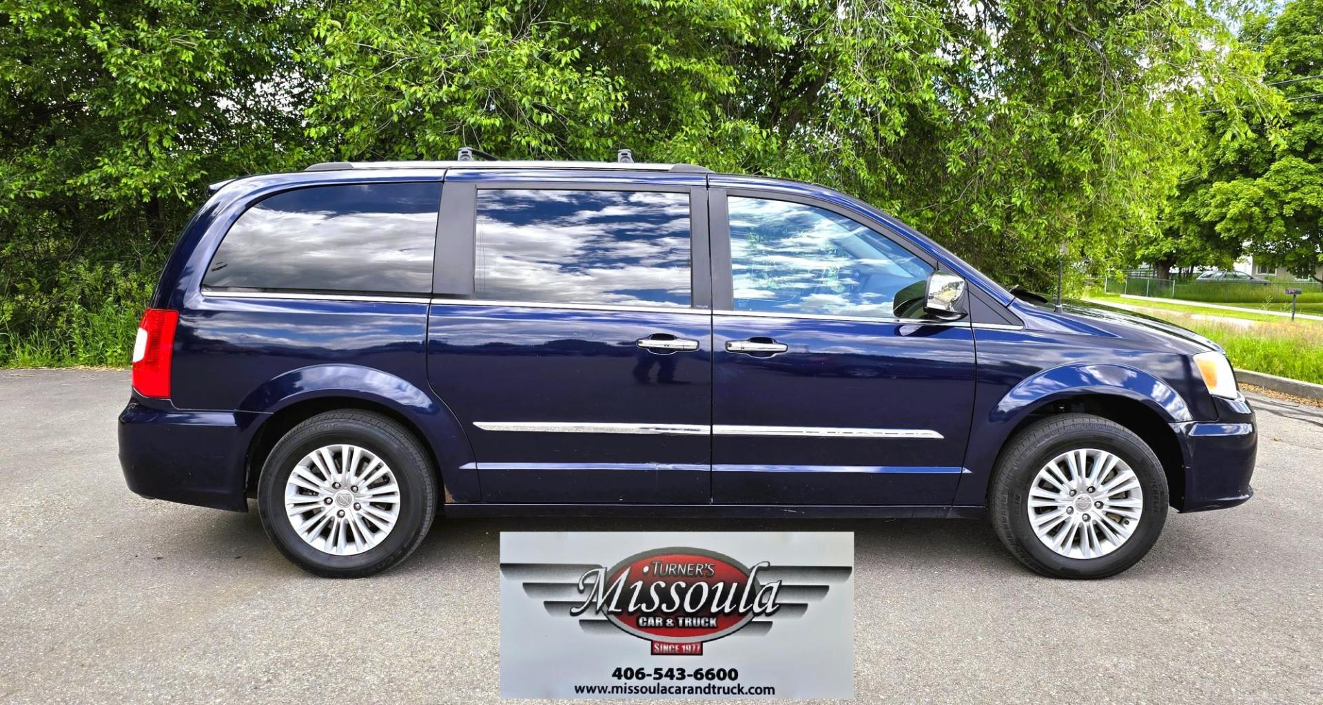 2013 Blue /Tan Chrysler Town & Country Limited (2C4RC1GG7DR) with an 3.6L V6 DOHC 24V engine, 6-Speed Automatic transmission, located at 450 N Russell, Missoula, MT, 59801, (406) 543-6600, 46.874496, -114.017433 - 2013 Town and Country FWD Mini-Van. These are getting hard to come by. This particular one has many features. 3.6L V6 Engine. 3rd Row Seating. Heated Front and Middle Seats. Heated Steering Wheel. DVD Entertainment System for the 2nd and 3rd Rows. Navigation. Bluetooth. AM FM SAT CD Player. Power Sl- Photo#0