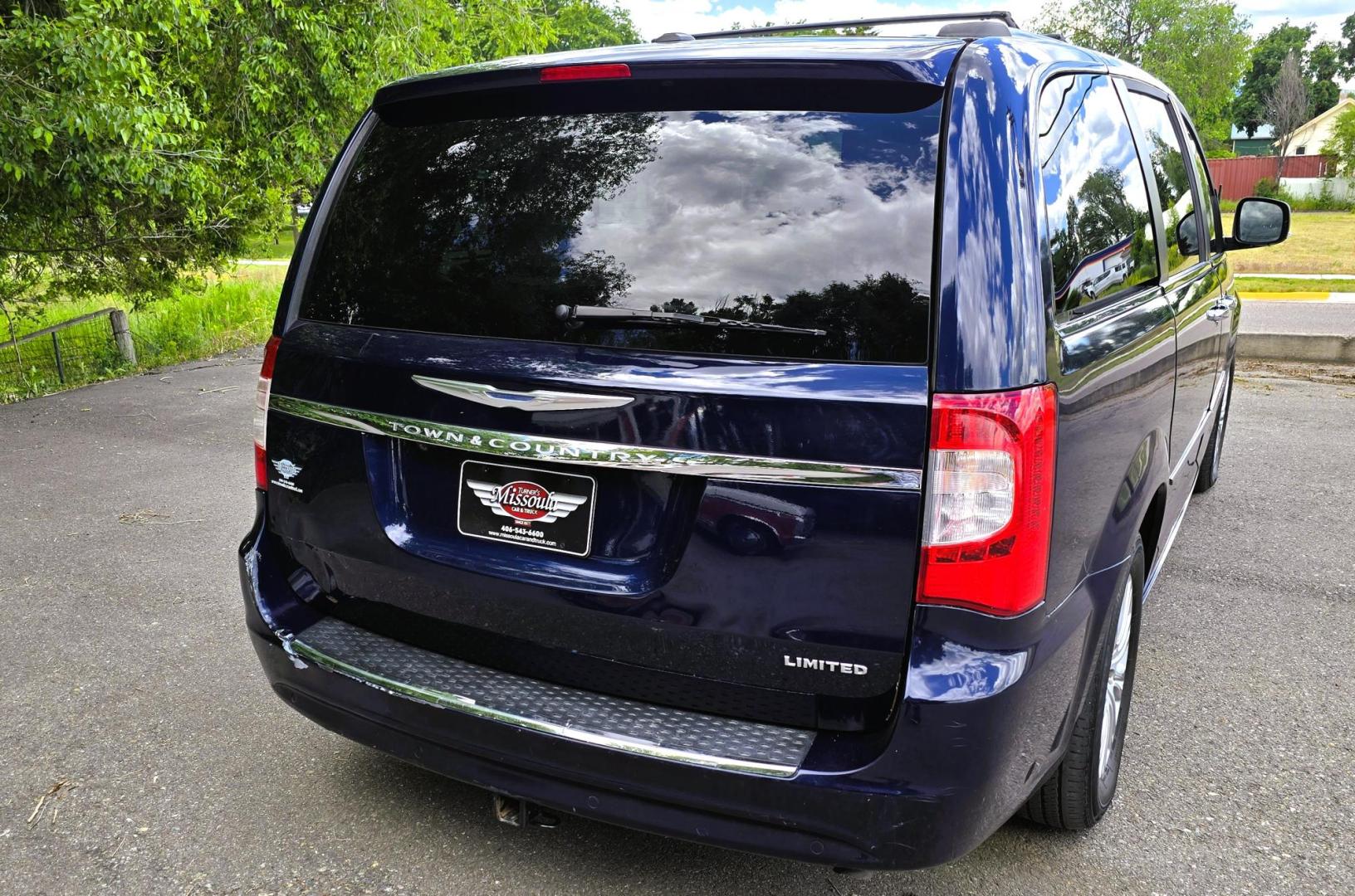 2013 Blue /Tan Chrysler Town & Country Limited (2C4RC1GG7DR) with an 3.6L V6 DOHC 24V engine, 6-Speed Automatic transmission, located at 450 N Russell, Missoula, MT, 59801, (406) 543-6600, 46.874496, -114.017433 - 2013 Town and Country FWD Mini-Van. These are getting hard to come by. This particular one has many features. 3.6L V6 Engine. 3rd Row Seating. Heated Front and Middle Seats. Heated Steering Wheel. DVD Entertainment System for the 2nd and 3rd Rows. Navigation. Bluetooth. AM FM SAT CD Player. Power Sl- Photo#4