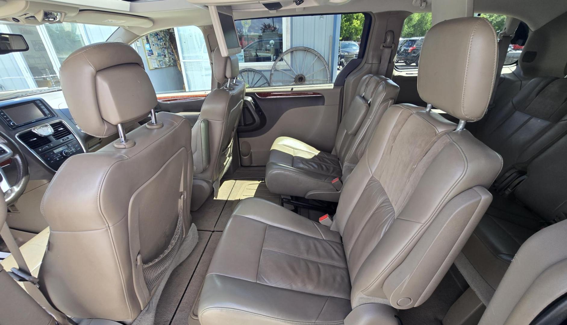 2013 Blue /Tan Chrysler Town & Country Limited (2C4RC1GG7DR) with an 3.6L V6 DOHC 24V engine, 6-Speed Automatic transmission, located at 450 N Russell, Missoula, MT, 59801, (406) 543-6600, 46.874496, -114.017433 - 2013 Town and Country FWD Mini-Van. These are getting hard to come by. This particular one has many features. 3.6L V6 Engine. 3rd Row Seating. Heated Front and Middle Seats. Heated Steering Wheel. DVD Entertainment System for the 2nd and 3rd Rows. Navigation. Bluetooth. AM FM SAT CD Player. Power Sl- Photo#10