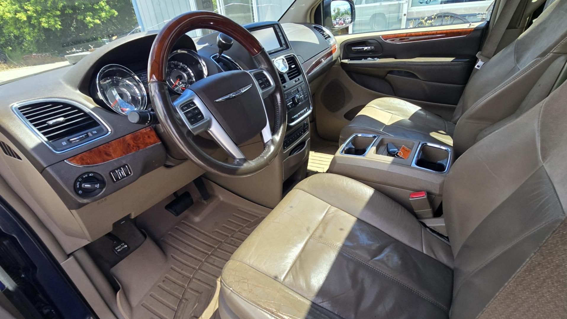 2013 Blue /Tan Chrysler Town & Country Limited (2C4RC1GG7DR) with an 3.6L V6 DOHC 24V engine, 6-Speed Automatic transmission, located at 450 N Russell, Missoula, MT, 59801, (406) 543-6600, 46.874496, -114.017433 - 2013 Town and Country FWD Mini-Van. These are getting hard to come by. This particular one has many features. 3.6L V6 Engine. 3rd Row Seating. Heated Front and Middle Seats. Heated Steering Wheel. DVD Entertainment System for the 2nd and 3rd Rows. Navigation. Bluetooth. AM FM SAT CD Player. Power Sl- Photo#15